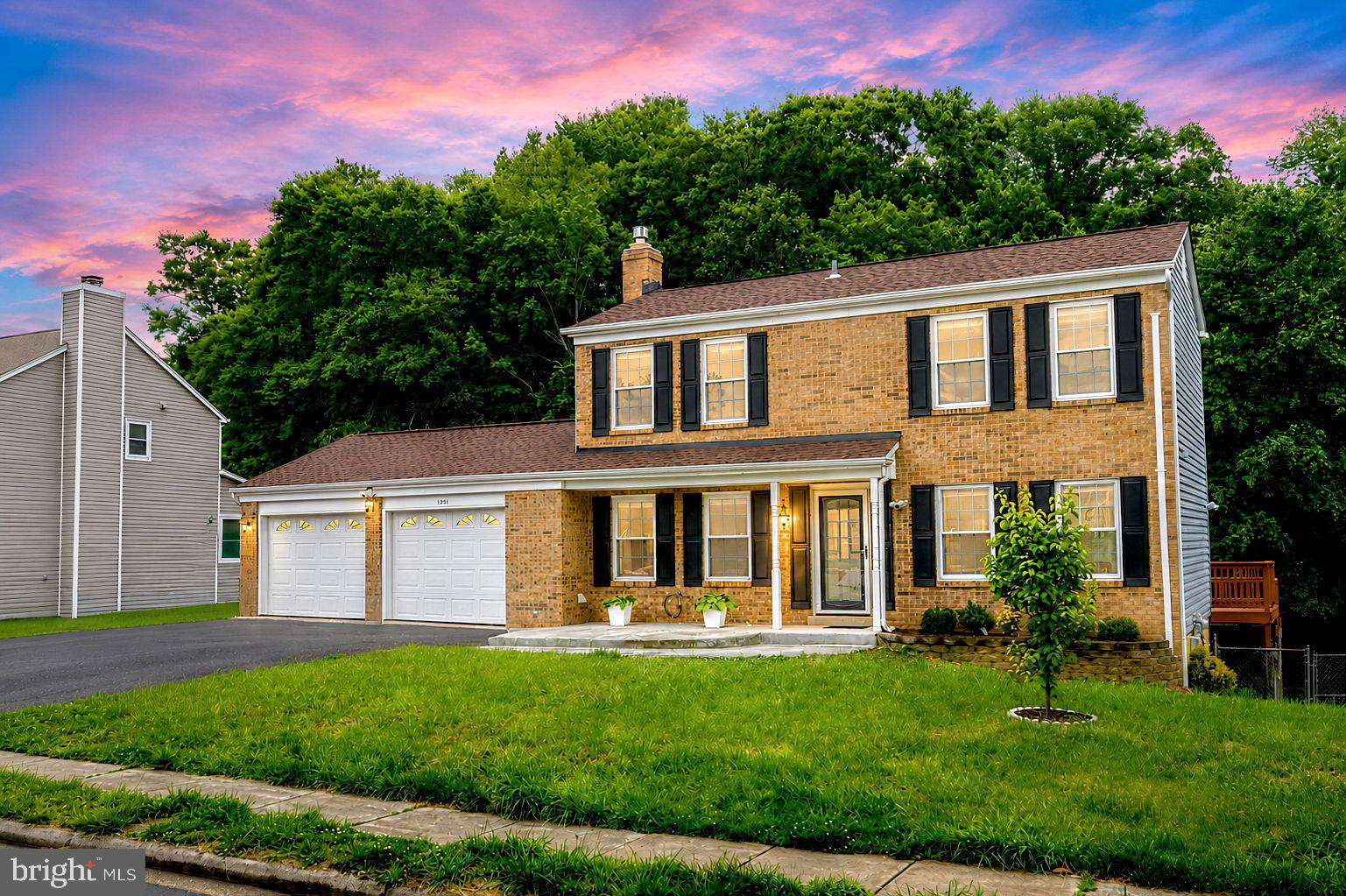 NO HOA - Beautifully renovated 3-level brick-front home backing to the wooded reserve in a sought-after mid-county community. This close-in location minutes to great commuter express options to DC and The Pentagon, VRE train stations, Quantico, and Ft Belvoir. Welcome friends and family on the large covered front porch opening to the foyer and impressive living room. The living room, with space for a baby grand, features a sliding glass door to the private 2-tiered back deck overlooking the beautiful, treed reserve. The kitchen opens to the contemporary dining room - perfect for entertaining and family celebrations. The fabulous chef's kitchen has hardwood 42" cabinetry, gorgeous Cambria Quartz counters with a stylish subway backsplash, energy efficient stainless steel gas appliances, and a pantry. The main level has a convenient guest powder room, a coat closet, and direct access to the 2-car garage. Upstairs, the impressive 14x14' owner's wing offers a luxurious en suite updated bathroom with a custom SPA walk-in shower with imported tile surround, and a designer 3-way shower system with a handheld shower bar and the ultimate rain shower! This primary suite has a walk-in closet and wood plank flooring. The upper floor has 2 additional bedrooms with a pretty shared hall full bathroom with a bathtub and storage vanity with new tile surround. The lowest walkout level has a wonderful open family recreation room, with work from home or workout space, and media area with a fireplace, perfect for watching the big game or bingeing movies! The family rec room has a sliding glass door that opens to the park-like fenced backyard. The lowest level has a 3rd full bathroom with a shower and a spacious guest room/home office or 4th bedroom (the window is too high to meet code). The lowest level has laundry and utility room with a full-sized washer and dryer, a laundry sink, the enviable tankless water heater with workshop/studio/storage space. This updated home offers and close-in location with a top school district (with AP, IB, and Performing Arts options) with an ideal blend of privacy, comfort, energy efficiency, outdoor entertaining space makes this the ideal Woodbridge home! The location offers a quick 3-mile drive to the Dale City Commuter lot, 6 miles to I-95, 13 miles to Quantico Marine Base, 17 miles to Ft Belvoir Pence Gate, 9 miles to the Manassas Amtrak/VRE Train, multiple DC/Pentagon Express commuter lots, and excellent neighborhood schools. Minutes to world-class shopping & dining at Stonebridge/Wegman's, Potomac Mills & historic Occoquan, kayaking, and fishing along the riverfront, biking, hiking, and running in nearby parks, fabulous public golf courses, and top-ranked PWC schools. Welcome HOME!