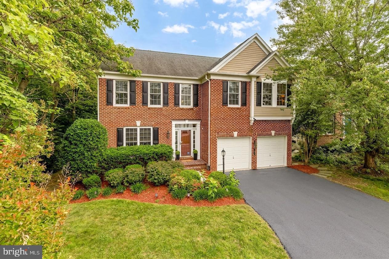 Welcome to this beautifully updated 4 bedroom, 2.5 bath residence in the highly desirable Laurel Hill community, offering more than 3,000 square feet of thoughtfully designed living space, timeless finishes, and a rare expansive flat backyard. Backing directly to protected parkland and surrounded by mature trees, the home enjoys an exceptional level of privacy and tranquility that is rarely available within the neighborhood. The secluded setting creates a true sense of retreat while still being moments from everyday conveniences. Recently refreshed throughout, the home has been completely repainted from top to bottom and enhanced with brand new carpeting, updated light fixtures, and refinished hardwood floors that bring a fresh, elevated feel to the interiors. Additional improvements include a roof replacement in 2018, solar panels added in 2020, a new washer and dryer in 2023, and a wine refrigerator added in 2025.

A gracious foyer introduces the home with formal living and dining rooms that create an elegant yet welcoming first impression. Refinished hardwood floors span the main level and pair beautifully with abundant natural light throughout. At the center of the home, the kitchen combines warmth and functionality with custom 42-inch cabinetry, granite countertops, a center island, stainless steel appliances including a professional Viking range with hood, a wine refrigerator, walk-in pantry, and a bright breakfast area framed by bay windows overlooking the backyard. Originally renovated by a prior owner in 2012, the kitchen remains both timeless and highly functional. Just off the kitchen, the soaring family room with vaulted ceilings and a gas fireplace creates a comfortable gathering space filled with warmth and light. Doors open directly to an elevated Trex deck overlooking the expansive flat lawn and private tree-lined setting, creating a seamless indoor-outdoor flow perfect for hosting, relaxing, or simply enjoying the peaceful surroundings. A private office, powder room, and attached two-car garage complete the main level.

Upstairs, the spacious primary suite offers a true retreat with walk-in closets and a beautifully maintained en-suite bath. Additional bedrooms and bathrooms are equally well cared for, while the upper-level laundry room adds convenience to everyday living. The lower level presents outstanding flexibility and future potential, with ample unfinished space ready for a recreation room, guest suite, fitness area, or expanded living space. Plumbing for a future full bath is already in place. Laurel Hill delivers a highly sought-after lifestyle with community amenities that are difficult to find elsewhere. The HOA provides access to a clubhouse, outdoor pool, tennis courts, pickleball courts, walking trails, and also covers maintenance of the pipestem asphalt surface, adding both convenience and value. Situated just moments from major commuter routes including I-95, Route 123, and the VRE, as well as everyday shopping and dining, this residence offers the perfect balance of comfort, convenience, privacy, and lifestyle in one of Northern Virginia’s most desirable neighborhoods.