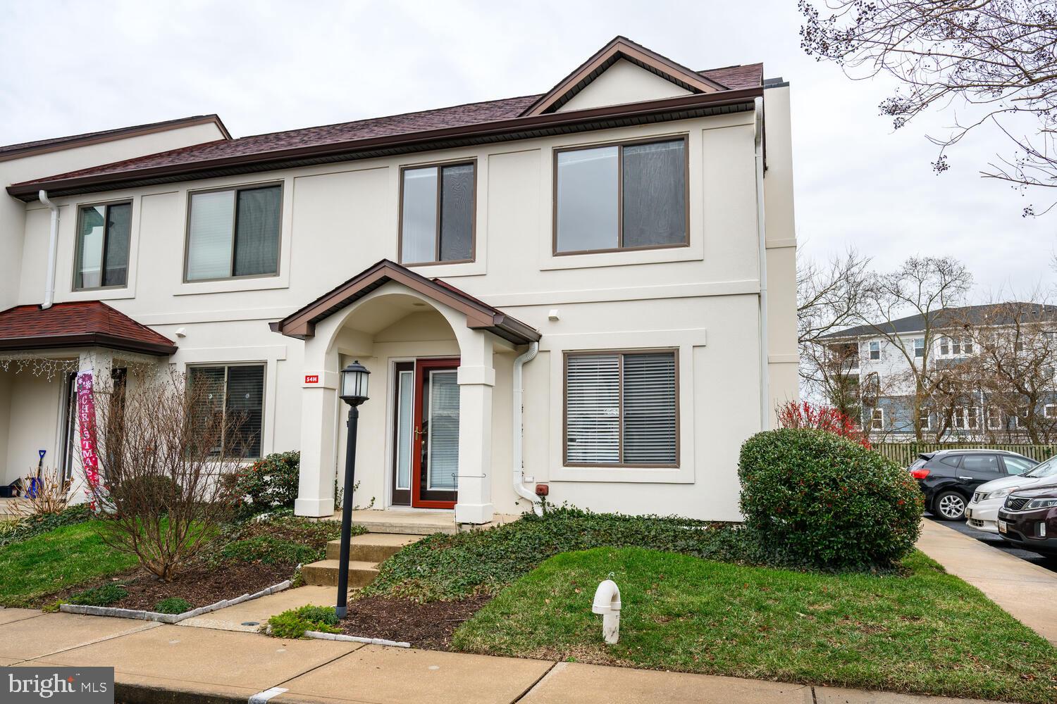 OPEN HOUSE, for the public,  Sunday, May 17, 11:00 to 1:00! Owners have lowered the price by $10,000 and are willing to look at offers! Nothing to do but move in! Be in this spring to enjoy all that summer offers on the shore!! This roomy 2 bedroom,  2.5 bathroom end unit has been completely painted in a beautiful neutral shade and has new carpet throughout the living areas and new vinyl flooring in the kitchen.  A propane fireplace highlights the great room turning chilly nights into cozy nights! On warm days, enjoy relaxing in the enclosed patio/porch or just being outside. Being an end-unit it offers lots of privacy. Any and all assessments have been paid by the owner, so you are ready to go and enjoy all the amenities that Queens Landing is known for...beautiful waterside pool, the club house with a party room, racquet ball court, exercise room, tennis courts, jogging trail, and more! Close to the cross-island trail, the Matapeake Dog Park, restaurants, schools, library...it is a wonderful place to live! Whether you are looking for a place to use as a vacation or weekend home, or as a year-round residence, this will suit both needs. It's situated in a great location...minutes to the Bay Bridge for any commuters to the western shore, and many airports,  and an easy drive to the MD and DE beaches! Note: 4 pictures have been Virtually Enhanced!