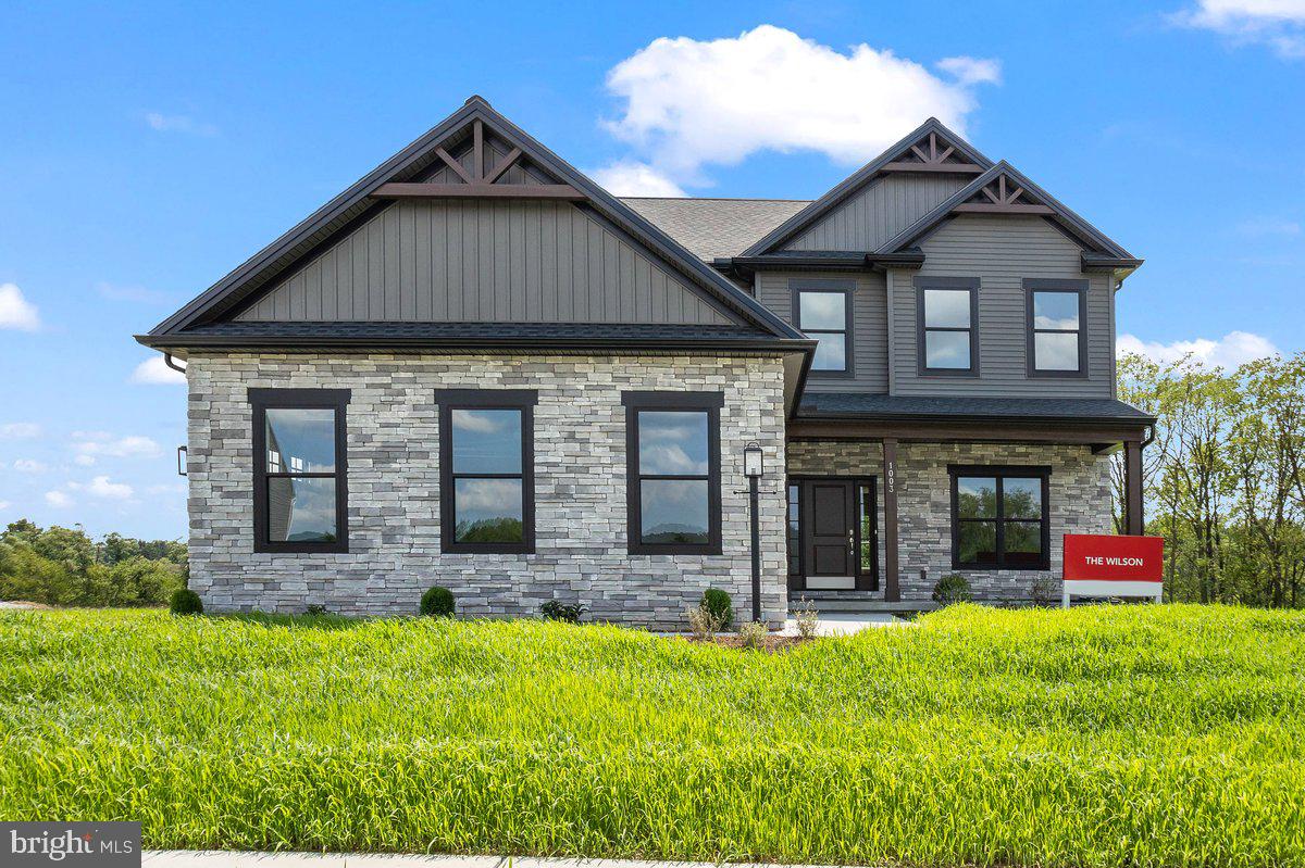 Introducing The Wilson, the latest plan crafted by our award-winning team. . Step inside this thoughtfully designed home, boasting 2576 sq. ft. of living space adorned with 9-foot ceilings on both the first and second floors. A gourmet kitchen featuring a gas stove, granite counters, an island, a pantry, and a seamless connection to the breakfast and family room. Additional highlights of the first floor include a separate living and dining room, a mudroom, a welcoming foyer, a convenient half bathroom, and luxury vinyl plank flooring throughout. The side entry three-car garage adds both convenience and functionality. Second floor, where you'll discover four bedrooms, two full bathrooms, and a dedicated second-floor laundry room. The Owner's Suite is a sanctuary, featuring a luxurious bathroom with a spacious walk-in shower, a large walk-in closet, and an elegant tray ceiling. Don't miss the opportunity to experience the exceptional design and quality of The Wilson. Schedule your tour today and envision the lifestyle that awaits you in this remarkable community.