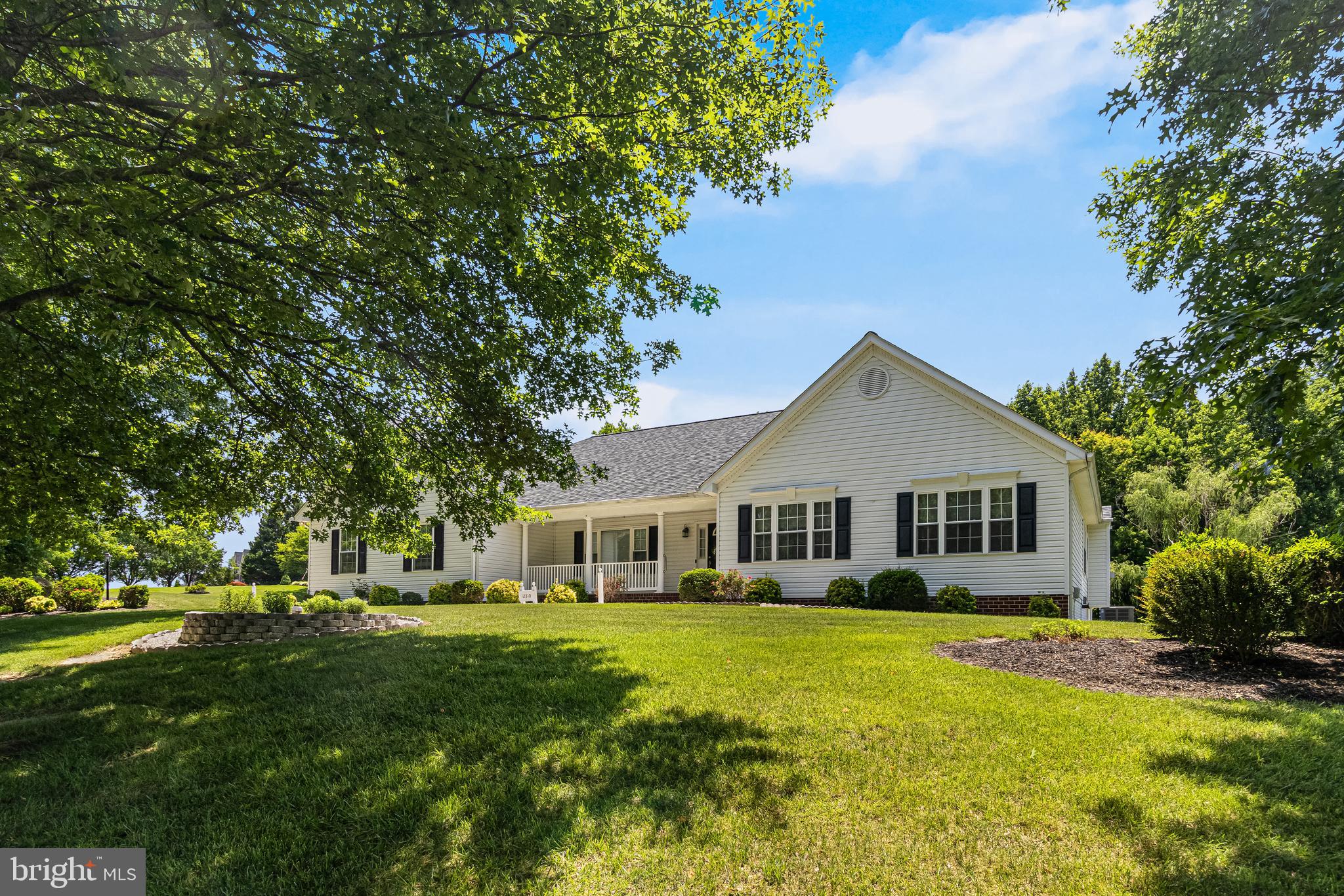Rare opportunities like this don't come along often! Nestled in the sought-after Lyons Creek Overlook community in Northern Calvert County, this beautifully maintained rambler offers true one-level living, a two-car attached garage, a two-car detached garage, (yes, four garage spaces) and a fully finished basement complete with its own one-bedroom apartment. Whether you're looking for multigenerational living, guest accommodations, or additional income potential, this home delivers incredible flexibility. The bright and spacious main level features an open floor plan, a large living room centered around a cozy gas fireplace, a formal dining room, and a beautifully appointed kitchen with granite countertops, abundant cabinetry, and a center island perfect for gathering. The expansive owner's suite with vaulted ceilings, offers plenty of room with a walk-in closet and a private en suite bath featuring dual vanities, a soaking tub, and a separate walk-in shower. Three additional bedrooms and a convenient powder room complete the main level. Downstairs, the fully finished basement boasts impressive nine-foot ceilings, two separate entrances, generous storage rooms, and a private one-bedroom apartment complete with its own kitchen, full bathroom, laundry, and living space. Outside, you'll appreciate the oversized driveway, in-ground sprinkler system, freshly updated deck with newer railings, and not one, but two garages providing exceptional storage for vehicles, hobbies, boats, or workshop space. Additional updates include a new HVAC system (2023) and a new roof (2024). Located in one of Northern Calvert County's most desirable communities, this property offers space, functionality, and versatility that's increasingly hard to find.