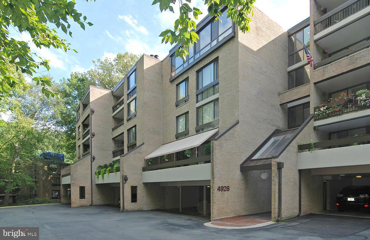 Beautiful corner unit w/ 3 exposures in private & secluded location in Sumner Village.  Fully renovated kitchen and bathrooms and freshly painted interior. Gracious entry, large living room with fireplace and glass doors that open to expansive, level terrace and gardens, dining room, table space kitchen,  2 spacious bedrooms, plus den (could be 3rd bedroom), two full and 1 half bathrooms.  Primary bedroom opens to oversized balcony. Two garage spaces and a large storage room convey. Enjoy extensive community amenities, including 24-hour gated entry, outdoor pool, tennis and pickleball courts, fitness and party rooms, a library, and a sauna. Ideally located next to the Shops of Sumner and near the new  Westbard Square. One block to Metro Bus, minutes to major roadways and DC, and direct access to The Capitol Crescent Trail.  Open Sunday, 5/18, 1pm-3pm.