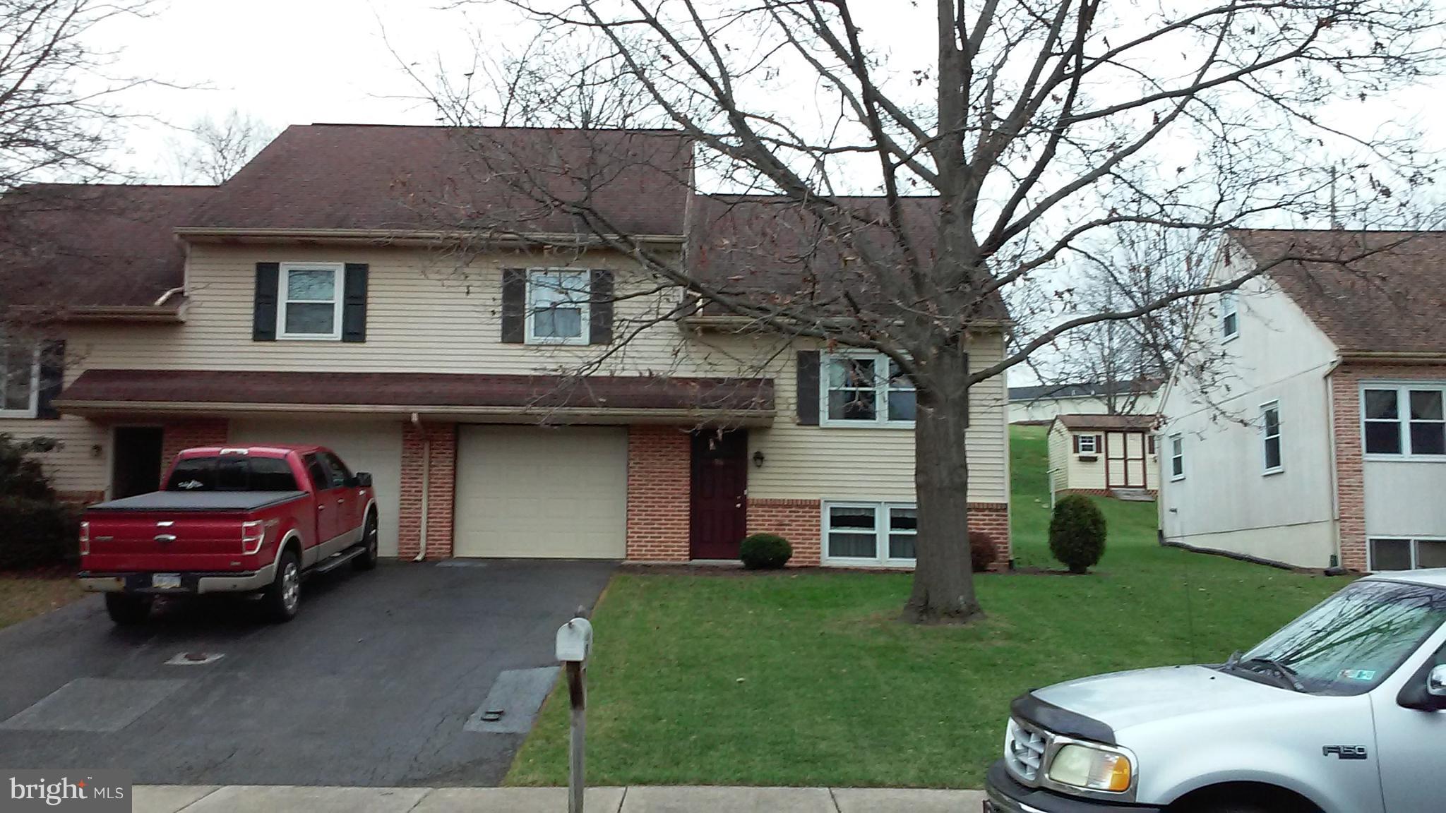 Pride of ownership is shown in this immaculate 3 bedroom Semi. Besides being spotless from top to bottom, it also has the following features: built-in AC unit in living room which cools most of the house, kitchen has been replaced and is nick free and scratch free (like new), refrigerator and washer and dryer included, all flooring is free of scuffs, cracks and stains, upper floor master bedroom has built-in gun cabinet/drawers/shelves, WIC closet, replacement windows, deck with railing, and detailed shed. Move right in and sit back and enjoy a home that doesn't need remodeling or work before you occupy it.