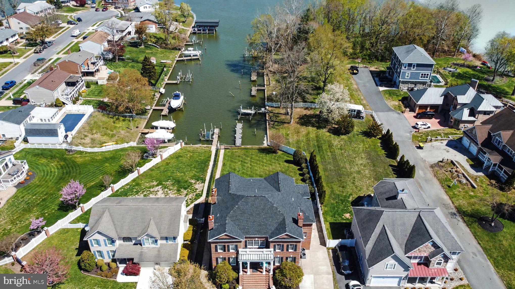 Nestled in the highly sought-after Taylor’s Pointe community of Joppatowne, this exceptional Colonial offers over 6,000 square feet of beautifully maintained living space, perfectly blending timeless elegance with modern comfort. Featuring 5 spacious bedrooms and 4.5 bathrooms, this home provides ample room for both everyday living and entertaining.  The five gas fireplaces add warmth and character throughout the home.

A grand two-story foyer creates an impressive first impression and sets the tone for the home’s sophisticated design. The open and functional layout flows seamlessly into the heart of the home, a gourmet kitchen equipped with new stainless-steel appliances, including a built-in microwave, downdraft cooktop, and wall oven. Thoughtfully designed for both convenience and style, the kitchen opens to the dining and living areas, making it ideal for gatherings. A wet/dry bar further enhances the home’s entertaining capabilities.  

Wood flooring and well-appointed finishes throughout add warmth and character. The expansive primary suite serves as a private retreat, complete with a generous walk-in closet and a spa-inspired en suite bathroom designed for relaxation. Additional bedrooms are generously sized, offering flexibility for guests, home office space, or multi-generational living.

The fully finished basement with outside access provides endless possibilities—perfect for a recreation room, media space, gym, or guest suite.

Step outside to your own private waterfront oasis. With approximately 50 feet of frontage along the scenic Gunpowder River, this property offers tranquil views and direct water access. The private composite dock is ideal for boating, fishing, or simply enjoying the peaceful surroundings. Whether hosting gatherings or unwinding at the end of the day, the outdoor space delivers a true waterfront lifestyle experience.

Recent updates include new kitchen appliances, a new roof, and a new HVAC system, offering added value and peace of mind. Additional features include a 2-car attached garage with interior access and a concrete driveway offering ample parking for guests.

This remarkable property combines space, location, and lifestyle in one of Joppatowne’s premier waterfront communities. Don’t miss the opportunity to make this exceptional home your own.
