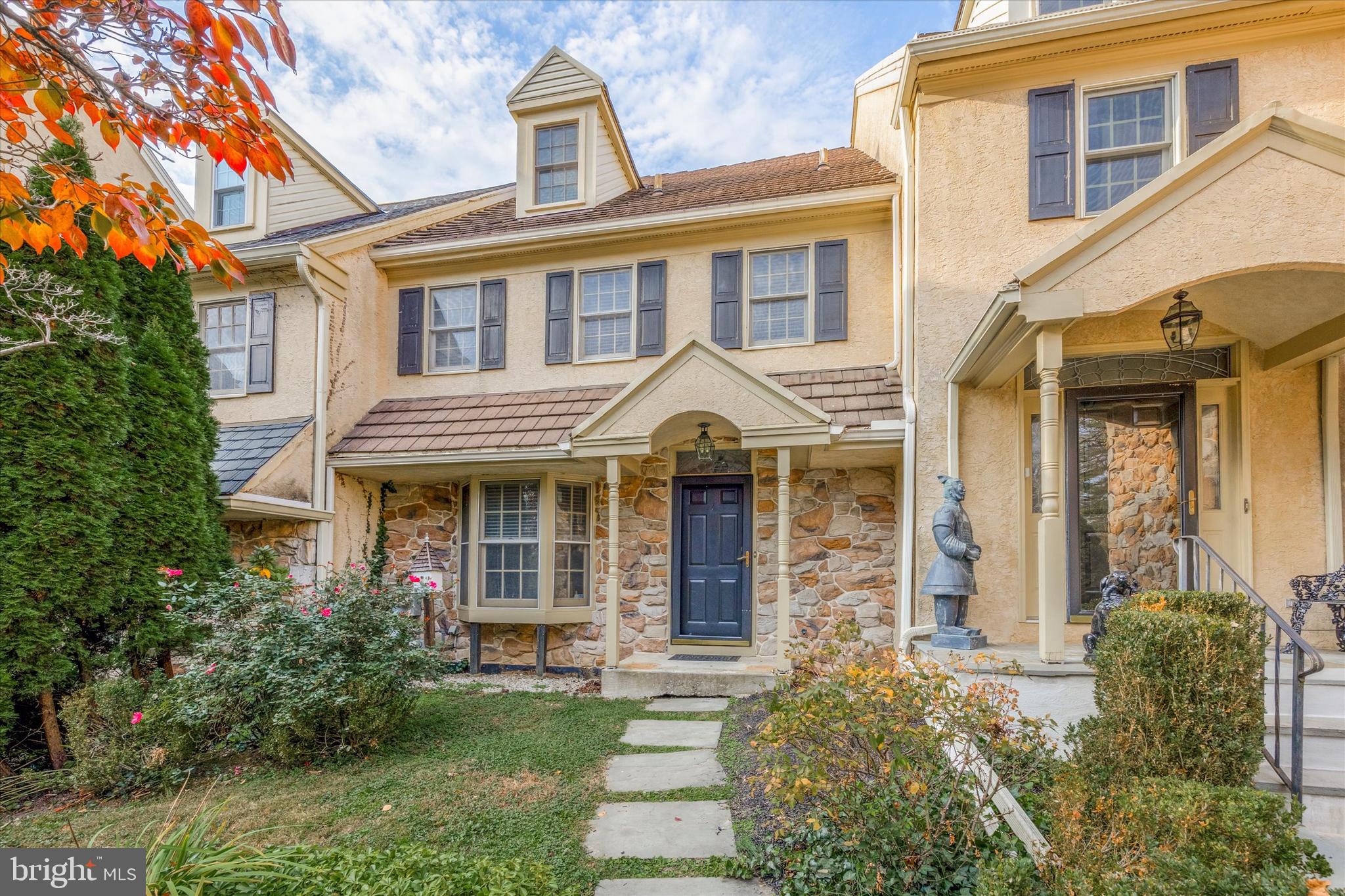 Charming and convenient townhouse nestled on a quiet cul-de-sac walkable to downtown Gladwyne! 
Step into a thoughtfully designed first floor, where a spacious kitchen with a pass-through window overlooks the open dining and living area. The living room, adorned with built-in bookshelves, a cozy gas fireplace, and sliding glass doors, leads to a private deck—perfect for relaxing evenings or entertaining guests. On the second floor, two inviting bedrooms await, accompanied by a conveniently-located hallway laundry area. The primary suite boasts a generously-sized bathroom featuring a separate shower and tub, as well as a walk-in closet. The second bedroom offers its own en suite bathroom with a tasteful tub/shower combo. Continue to the third floor, where another expansive bedroom with an en suite bathroom awaits, providing versatility and ample space. The finished basement, with its sliding glass doors, opens up to a small patio area. This sweet space is walkable to all that Gladwyne has to offer and a convenient drive to Philadelphia and major highways.