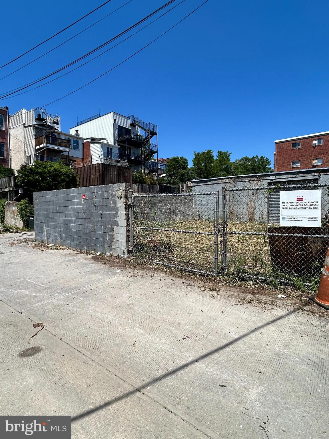 1 Wootten Ct is a rare alley lot located in the RF-1 zoning district, offering flexible use for parking income or future development. The site has potential for up to 18 parking spaces, with estimated value of approximately $30,000 per space if sold individually, or it can be leased for ongoing monthly parking income.
Because of its alley access and layout, the lot also offers a unique opportunity to maximize underutilized space by providing parking to surrounding properties, which supports strong local demand for off-street parking.
If developed and leased as parking, the site has the potential to generate approximately $300–$500 per space per month, creating a strong income-producing asset.
Zoned RF-1, the property also allows for potential two-unit condominium development, subject to zoning compliance and approvals, offering multiple exit strategies for an investor.

Buyer to perform their own due diligence, including zoning, permitted uses, development feasibility, engineering, parking capacity, and all required governmental approvals. Property is sold as-is with no representations or warranties regarding development potential or parking capacity.