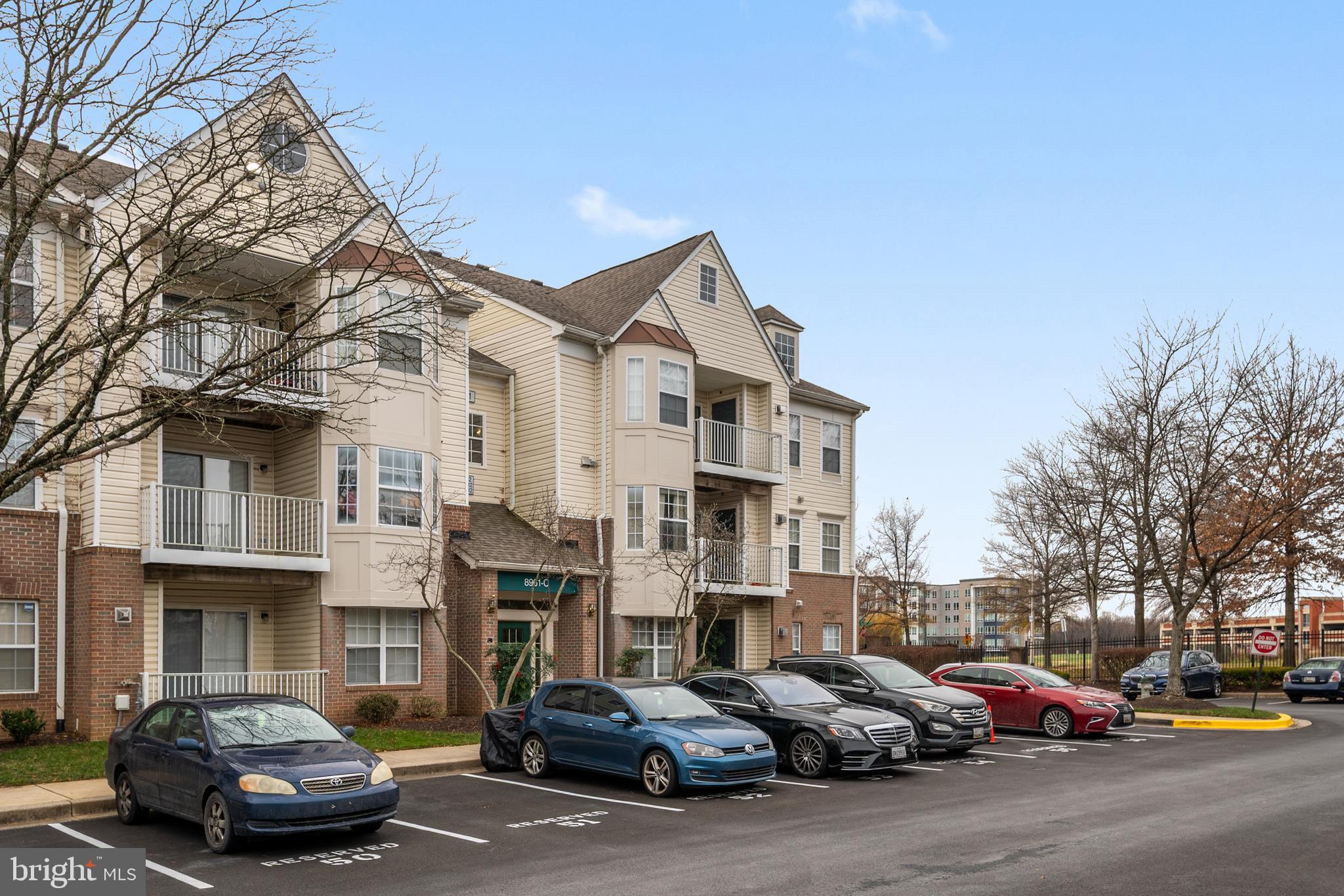 5-minute walk to the Largo Metro Station (Blue & Silver line) and immediate access to the I-495 beltway, this home offers unmatched convenience for commuters working throughout the D.C. metro area. Residents in this gated community enjoy reserved parking and access to peaceful walking trails around the adjacent Lake Largo. 
Inside, this property features vaulted ceilings, a gas fireplace, in unit washer/dryer, remodeled bathrooms, and newly installed carpeting that creates a comfortable and welcoming living space. The 2nd bedroom is equipped with a queen-size murphy bed, providing flexibility for the space to function as a guest room, nursery, home office, or multipurpose space. Additionally, the home includes a brand-new HVAC system that will provide consistent comfort year-round.