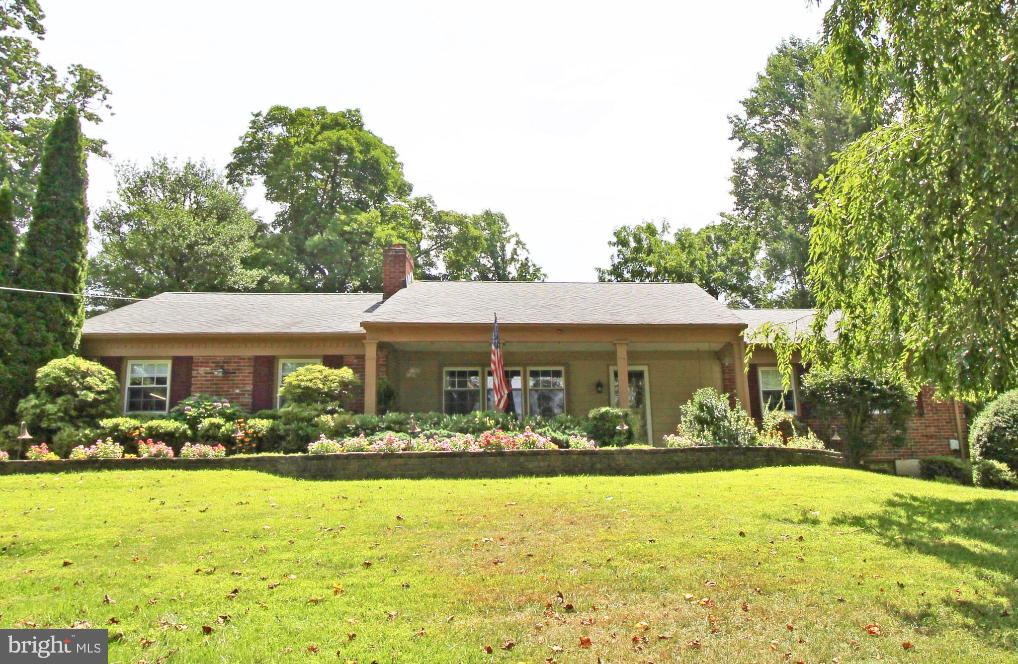**Offer Deadline set for Sunday, April 27 at 6pm** Welcome to 14 Glenview Road, a stunning ranch-style home nestled on 1.2 acres in the award-winning Garnet Valley School District. This beautifully updated and meticulously maintained 3-bedroom, 2.5-bathroom single-family home offers the perfect blend of comfort, style, and space. Step into the family room, providing easy access to both the charming four-seasons room and the attached two-car garage. The heart of the home is the gorgeous kitchen, featuring granite countertops, a stylish subway tile backsplash, and seamless flow into the formal dining room — complete with French doors that open to a private and inviting patio, perfect for outdoor entertaining. Just off the dining area, the bright and airy living room showcases rich hardwood flooring, abundant natural light, and a cozy wood-burning fireplace — an ideal spot to relax and unwind. Down the hall, you'll find two spacious bedrooms and an updated hall bath, along with a private primary suite featuring its own en-suite bathroom. The fully finished basement is a true showstopper, offering endless possibilities. Enjoy a versatile space currently set up with a playroom, fitness and office areas, a half bath, laundry room, a cozy movie/entertainment zone, and a full wet bar for hosting friends and family. Outside, enjoy the peaceful surroundings, two handy storage sheds, and proximity to Newlin Grist Mill, parks, shopping, and dining. Don't miss the opportunity to call this move-in-ready gem your own — schedule your private showing today!