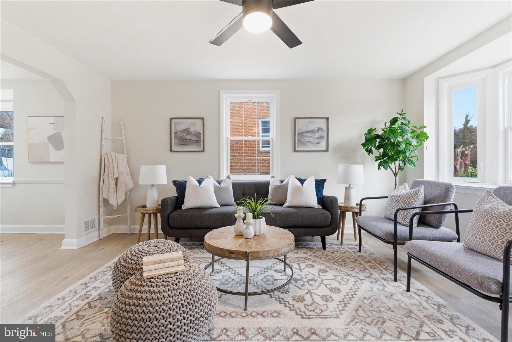 MOTIVATED SELLER!! Beautifully renovated 4-bedroom, 2 full bath end-of-group rowhome in desirable North Bend! This light-filled home features an abundance of natural sunlight, highlighted by two stunning bay windows — one in the living room and one in the dining room — creating bright and welcoming spaces throughout.

The updated kitchen is designed for both style and functionality, offering quartz countertops, a spacious island, stainless steel appliances, and gas cooking. Step right out to the deck off the kitchen — perfect for entertaining or enjoying outdoor dining.

Upstairs, you’ll find three comfortable bedrooms with plush carpeting and a fully renovated bath featuring modern finishes.

The finished lower level provides a versatile fourth bedroom along with additional finished space ideal for a home gym, office, or recreation area.

Relax on the charming front porch — the perfect spot for morning coffee or evening cocktails. With thoughtful updates, generous living space, and incredible natural light, this home is truly move-in ready!