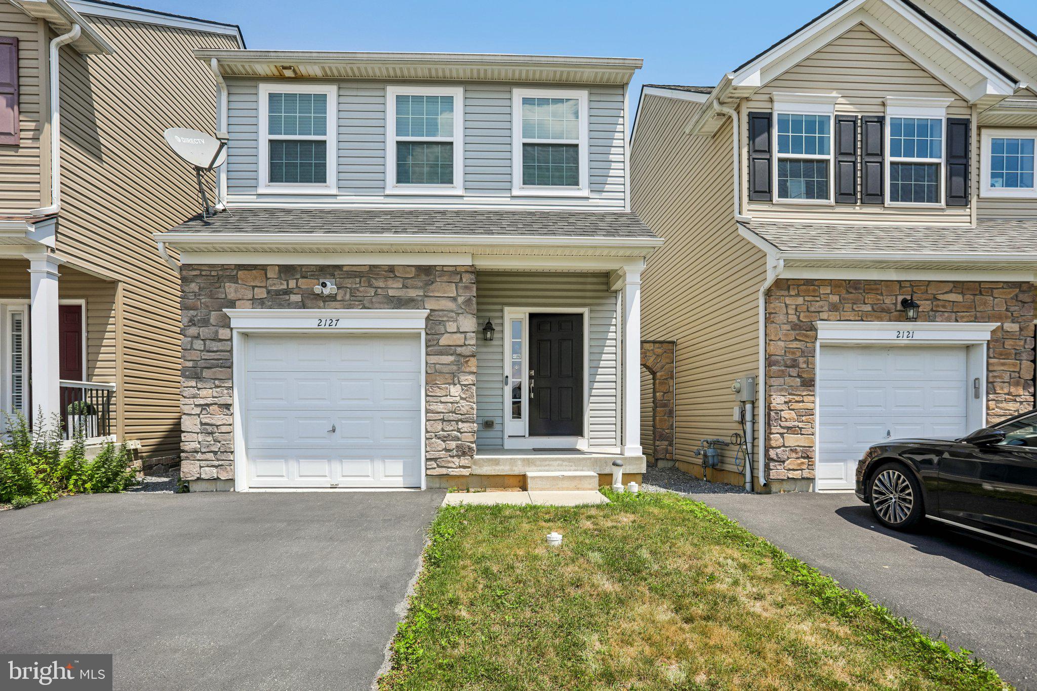Welcome to Grocer’s Alley at Sullivan Trail, where you'll enjoy the space and privacy of a single-family home with the convenience of a detached townhouse—without HOA fees. Built in 2019, this immaculate, move-in-ready home offers a thoughtfully designed, light-filled open-concept floor plan ideal for today's lifestyle. The main level features a spacious family room with a cozy gas fireplace, luxury vinyl plank flooring, and a convenient powder room. The beautifully appointed kitchen is the heart of the home, showcasing a large center island, granite countertops, upgraded cabinetry, stainless steel appliances, and an adjoining dining area perfect for everyday living and entertaining. Upstairs, you'll find three generously sized bedrooms, a convenient second-floor laundry area, and a full hall bath. The spacious primary suite offers a large walk-in closet and a private ensuite bath with beautiful tile finishes. A second walk-in closet in the front bedroom provides additional storage. The expansive unfinished daylight basement with egress windows offers exceptional storage and endless possibilities for future living space, a home gym, recreation room, or workshop. Relax on the welcoming covered front porch or enjoy outdoor dining and entertaining on the private rear patio. Complete with a one-car attached garage and efficient natural gas heat, this exceptional home is ideally located just minutes from shopping, parks, downtown Easton, and major commuter routes. Don't miss the opportunity to make this beautiful home yours. Schedule your private showing today!