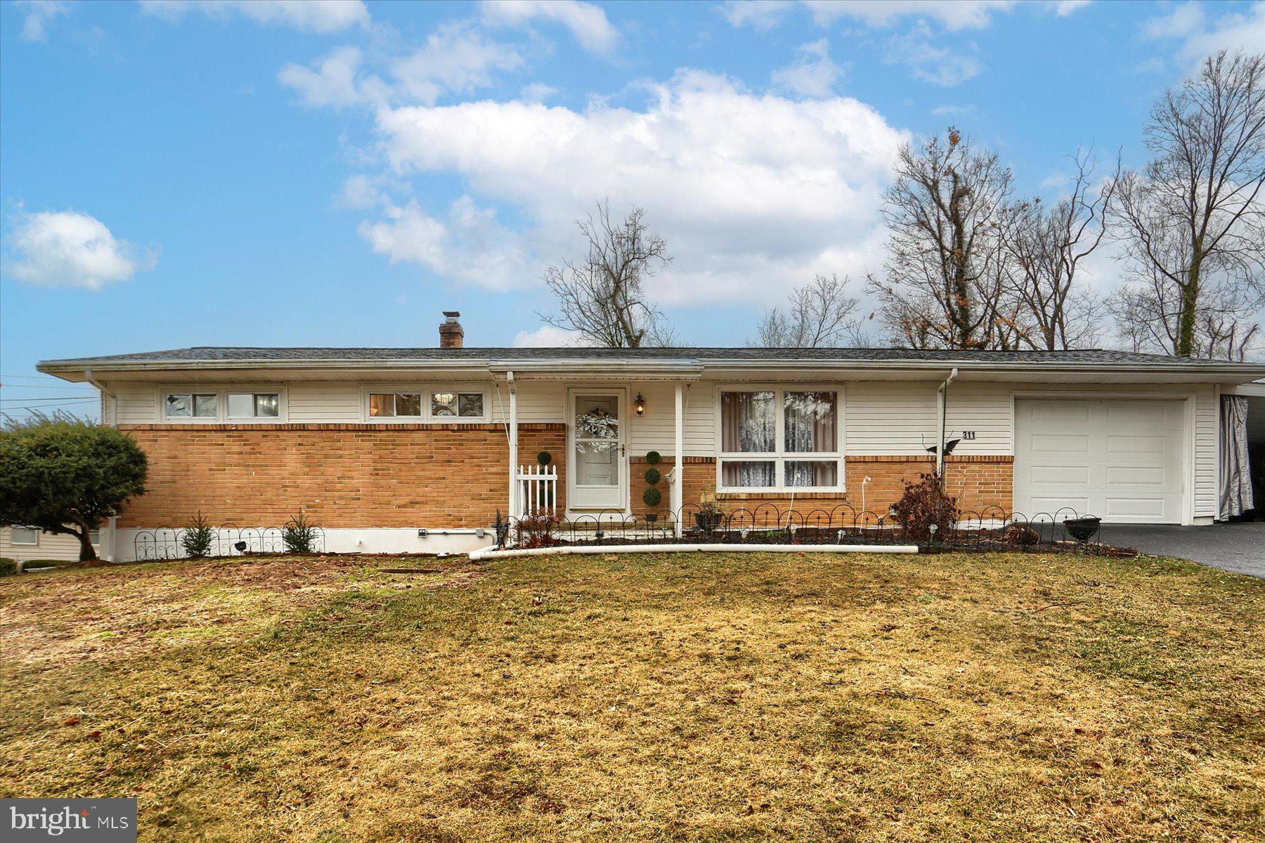 Charming and meticulously maintained Ranch Home – Move-In Ready! This delightful home offers nearly 2,000 sq. ft. of finished living space —all in a prime location just minutes from I-83, the Turnpike, parks, and Yellow Breeches Creek! Step onto the inviting covered front porch and into a sun-filled living room that radiates warmth and comfort. The eat-in kitchen boasts new LVP flooring, classic cabinetry with a lazy Susan, and a seamless flow into the elegant dining room, which leads to a sunny home office that added 100 sq.ft. to the home in 2012. The main level features three cozy bedrooms with laminate flooring and a beautifully updated bathroom with marble flooring. Downstairs, the spacious basement offers a large family room with recessed lighting, a fourth bedroom, and a full bath—perfect for additional living space or guests. Enjoy peace of mind with recent updates, including: New roof (2023); Updated siding (2016); All windows replaced (except living room, 2009); Freshly painted entire house (2023); Laminate floors throughout first floor and LVP in kitchen (2024); New electric stove, dishwasher & washer; New Garage door opener (2023); Both bathrooms new toilets (2021); Generator system (2019); Second garage (2017); Active radon mitigation system; Spacious shed (2015) and newer driveway. Outside, a newly installed composite deck (2022) and the fenced-in backyard offers a perfect retreat, complete with a peach tree—ready for you to pick fresh fruit! This well-maintained, move-in-ready home is a rare find. Schedule your showing today!