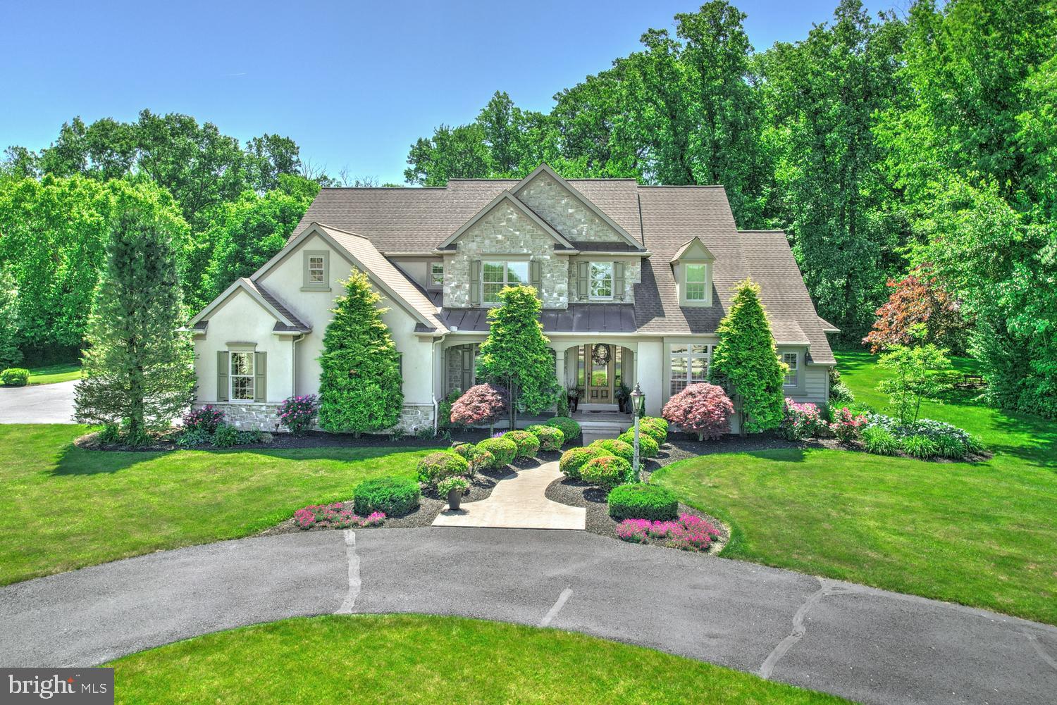 THIS PROPERTY IS GOING TO AUCTION ON SATURDAY SEPTEMBER 12, 2026 @ 11:00 AM. THE LIST PRICE ONLY REFELCTS THE SUGGESTED STARTING BID. Custom-built by Norman Graham, Colonial style home with a 4-stall horse barn on a 4.86 acre tract. Main floor features a gourmet kitchen with center island/bar, granite counters, walk-in pantry, breakfast nook; formal dining room; in-home office/study; great room with vaulted ceiling and gas fireplace; primary bedroom with private bath; laundry; half bathroom. Second floor offers a landing area with library nook; 3 additional bedrooms and 2 full bathrooms (one is a Jack/Jill bathroom). Central Vac; central A/C; economical geothermal multi-zone heat source; 2-LP water heaters, 1,000 gallon LP tank services house and barn. Private stamped concrete rear patio area with Edison lighting and LP hook-up for grill; professional landscaping; nice paved circle driveway. 2,232 sq. ft. 4-stall horse barn with apartment - 1st floor has 4-stalls; wash bay; tack room; garage bay; restroom. Upper level apartment features a kitchen; dining area; living room with gas fireplace; spiral staircase to loft; 3-bedrooms; full bath; laundry. Barn has meter for gas and electric. Nicely groomed outdoor ring; several pastures and stream. The grounds are groomed to perfection!