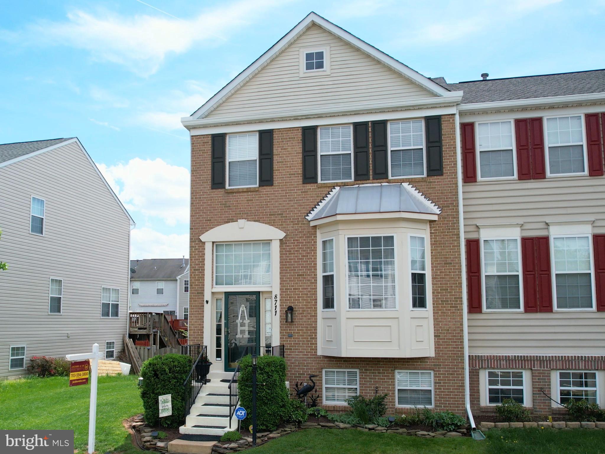 Welcome Home!

Are you searching for a stunning end-unit townhome in a peaceful, well-kept community? Look no further! This spacious five-bedroom, three-and-a-half-bath home has everything you need—and more.

Enjoy the beauty and practicality of zero carpet throughout the home, plus an expanded basement that includes an additional bedroom and a dedicated office space—perfect for guests or working from home.

Safety and peace of mind are a priority, and with a newly installed ADT security system, you'll feel secure and protected from day one.

Love to cook? You’ll fall in love with the modern kitchen, featuring granite countertops and a brand-new dual oven, ideal for preparing multiple dishes with ease.

Convenience is key, and this home is located just minutes from Liberia Avenue in Manassas, offering quick access to gyms, grocery stores, restaurants, and a wide range of other amenities.

And to complete this warm and inviting home, a new electric fireplace has been added—creating a cozy ambiance that's perfect for relaxing evenings or entertaining guests.

As for the community, Sheffield Manor HOA offers a community clubhouse perfect fro your social gatherings that are too big for home, as well as and olympic sized swimming pool and kiddie/wading pool that is supervised at all times by a certified lifeguard! Are you an outdoor person? You’re covered too! With multiple trails, a two acre fishing pond, and multiple tennis, basketball, and pickleball courts for both our nature lovers and our athletes!

Don’t miss the opportunity to make this beautiful home yours!