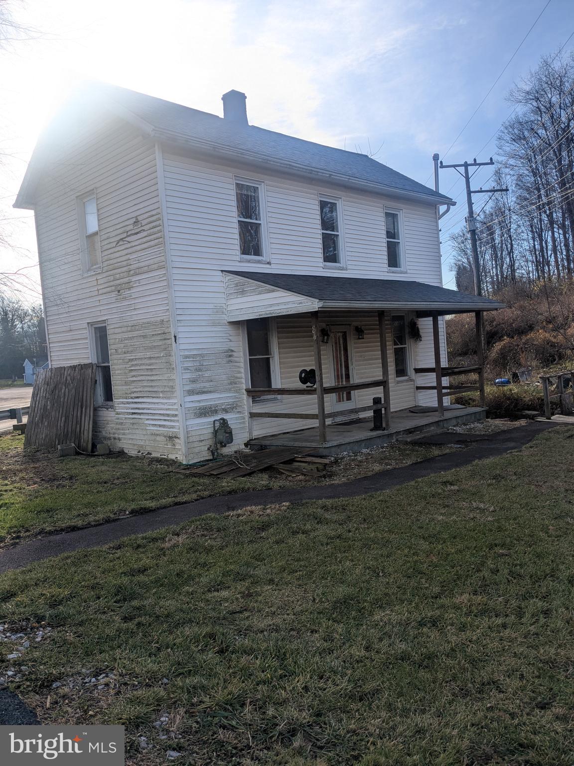 INVESTOR ALERT! Brand NEW Roof! This home could be great for a rental or single family. The property needs just a little TLC to make it a home again. The home is vacant and utilities are off. The basement has a sump pump and is unfinished. the driveway has ample parking.