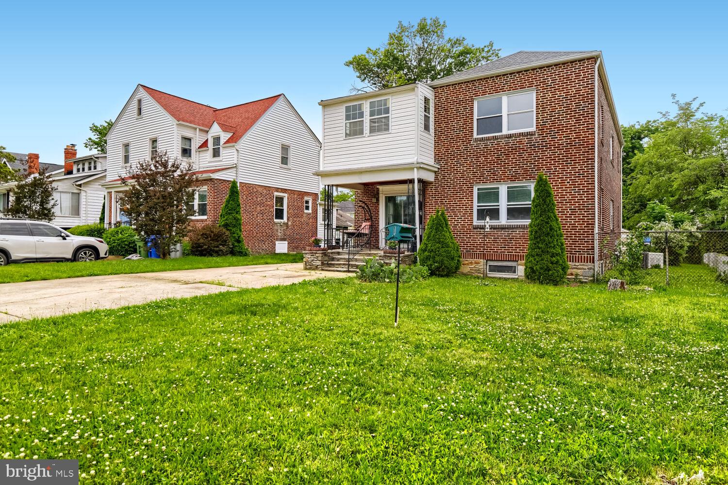 Exceptionally large greater Ashburton single-family home offering approximately 3,900 finished square feet, an impressive finished lower-level in-law suite, and a flexible layout that is hard to find. Currently arranged with five bedrooms and three full baths, the home could potentially be reconfigured to create up to seven bedrooms, making it a great fit for large households, multi-generational living, guests, home offices, or buyers who simply need more space. The main level features a bright office/study, separate dining room, large living room with fireplace, convenient main-level bedroom, adjacent full bath, hardwood flooring, classic crown molding, French doors, and wide openings. The kitchen offers dark solid-wood cabinetry, granite counters, updated appliances, and great counter space. Upstairs includes a spacious primary bedroom with walk-in closet and front-facing sunroom/sitting area, along with multiple generously sized rooms. The finished lower level is a major bonus, offering approximately 1,200 sq. ft. with almost 8-foot ceilings, full kitchen, bedroom, renovated bath, living room, large closets, and private washer/dryer. Major renovations in 2014–2015 included the roof, central HVAC, kitchens, refinished areas, and basement suite, with additional updates since. Brick and stone exterior with an original 4-foot brick front privacy wall, two-car garage, and driveway parking for approximately four cars. A rare amount of space, parking, character, and flexibility in a quiet, sought-after Ashburton-area community!