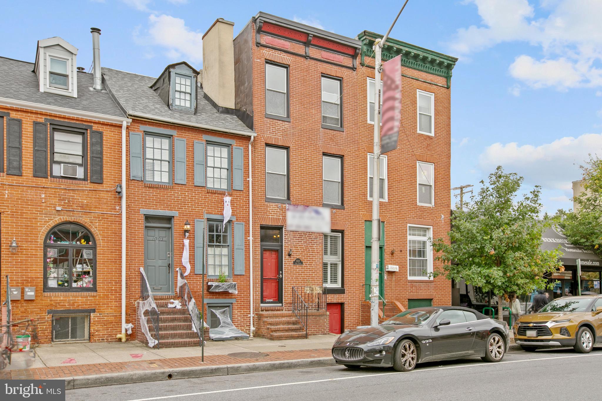 3 STORY FEDERAL HILL ROW HOME WITH PARKING!  ALL NEW CARPET ON UPPER LEVELS.  BRAND NEW FULL BATHROOM IN OWNERS SUITE ON 3RD FLOOR.   OPEN FLOOR PLAN ON MAIN LEVEL WITH HARDWOOD FLOORS, EXPOSED BRICK, LARGE POWDER ROOM INCLUDING FULL SIZE WASHER AND DRYER, GRANITE COUNTERTOPS & STAINLESS  STEEL APPLIANCES!   THE SECOND FLOOR FEATURES 2 LARGE BEDROOMS  + OFFICE NOOK AND UPDATED FULL BATHROOM IN THE HALLWAY.  REAR BEDROOM HAS PRIVATE PATIO. THE ENTIRE 3RD FLOOR IS THE OWNERS SUITE!  TONS OF SQUARE FOOTAGE WITH PARKING IN A+ FEDERAL HILL LOCATION.