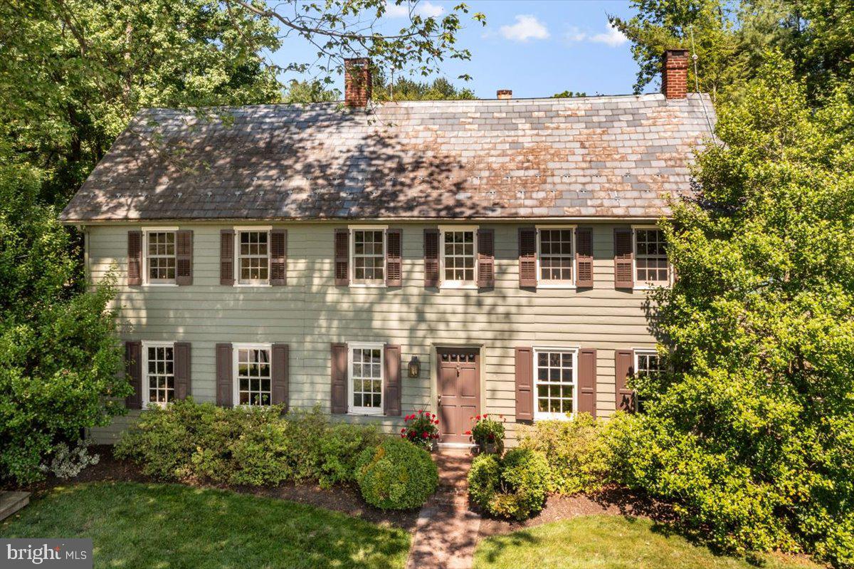 Nestled amidst tranquil surroundings, this vintage treasure offers an enchanting fusion of classic allure and contemporary comfort. Prepare to be transported to a realm of timeless beauty as you step into this charming historic farmhouse, a testament to America's rich heritage.
Dating back to approximately 1780, with subsequent expansions in 1860 and 1960, this architectural marvel underwent a meticulous restoration in the 1990s. This careful preservation effort honors the home's original character while seamlessly integrating modern amenities, resulting in a residence that exudes warmth, charisma, and sophistication at every turn.
At the heart of the home lies the farmhouse kitchen, a harmonious blend of rustic charm and modern functionality. Here, culinary delights are prepared amidst the comforting glow of a gas fireplace, creating an inviting space for both gastronomic adventures and convivial gatherings. Adjacent to the kitchen, a delightful solarium beckons, offering a sanctuary of natural light and breathtaking views of the meticulously manicured lawns and gardens, reminiscent of a bygone colonial era.
Emanating a sense of history and heritage, the interior boasts authentic hardware, exposed beams, and pumpkin pine floors, each element contributing to the home's timeless appeal. Three fireplaces further enhance the ambiance, providing cozy nooks for relaxation and entertainment. Ascend to the second floor via one of three staircases, each offering its own unique charm, and discover a spacious primary en suite, three additional bedrooms, and a full bathroom, ensuring ample space for rest and rejuvenation.
Completing this idyllic retreat is a charming ensemble of three smaller buildings, perfect for indulging in creative pursuits or simply unwinding amidst the serene surroundings. For the car enthusiast, an oversized 3+ bay garage with an expansive workroom upstairs, along with an additional 2 bay detached garage, provide ample space for collections and projects.
With its seamless blend of old-world elegance and modern comforts, this historic farmhouse promises a truly exceptional living experience. Embrace the opportunity to script your own narrative within these hallowed walls, where past and present converge in perfect harmony, inviting you to become part of its storied legacy. Welcome home to a place where memories are made and dreams take flight.