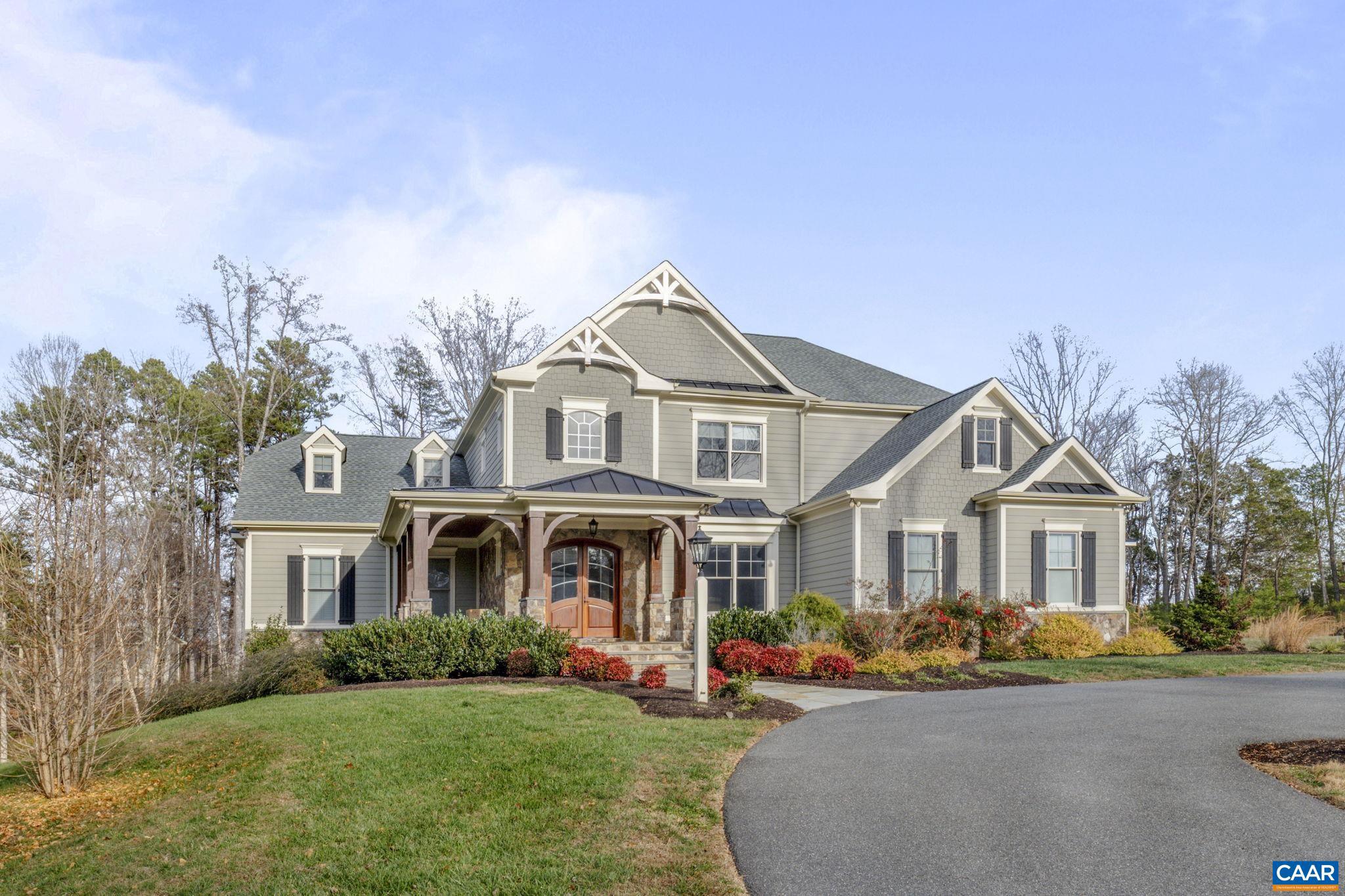 Stunning custom home in Keswick?s equestrian community of Hidden Hills. This 8,000+SF home situated on 20 beautiful acres. This home boast a great room with 20 foot ceilings, 2 story floor-to-ceiling natural stone fp with bluestone hearth, and custom built-in cabinets. French country inspired kitchen with upgraded custom cabinets, quartz countertops, Wolf gas range w/convection, sub zero refrigerator/freezer, large island and walk-in pantry. There are two primary suites with spa-like bath, billiard room, and wine cellar! Enjoy plenty of outdoor living with a screened-in porch, rear deck with built-in wolf outdoor grill, patio with natural stone fireplace, a wood-burning fire pit and horseshoe pit.  Whole house generator 38KW powered by propane. The features are too many to list (see attached list of features under documents).,Quartz Counter,Wood Cabinets,Exterior Fireplace,Fireplace in Family Room
