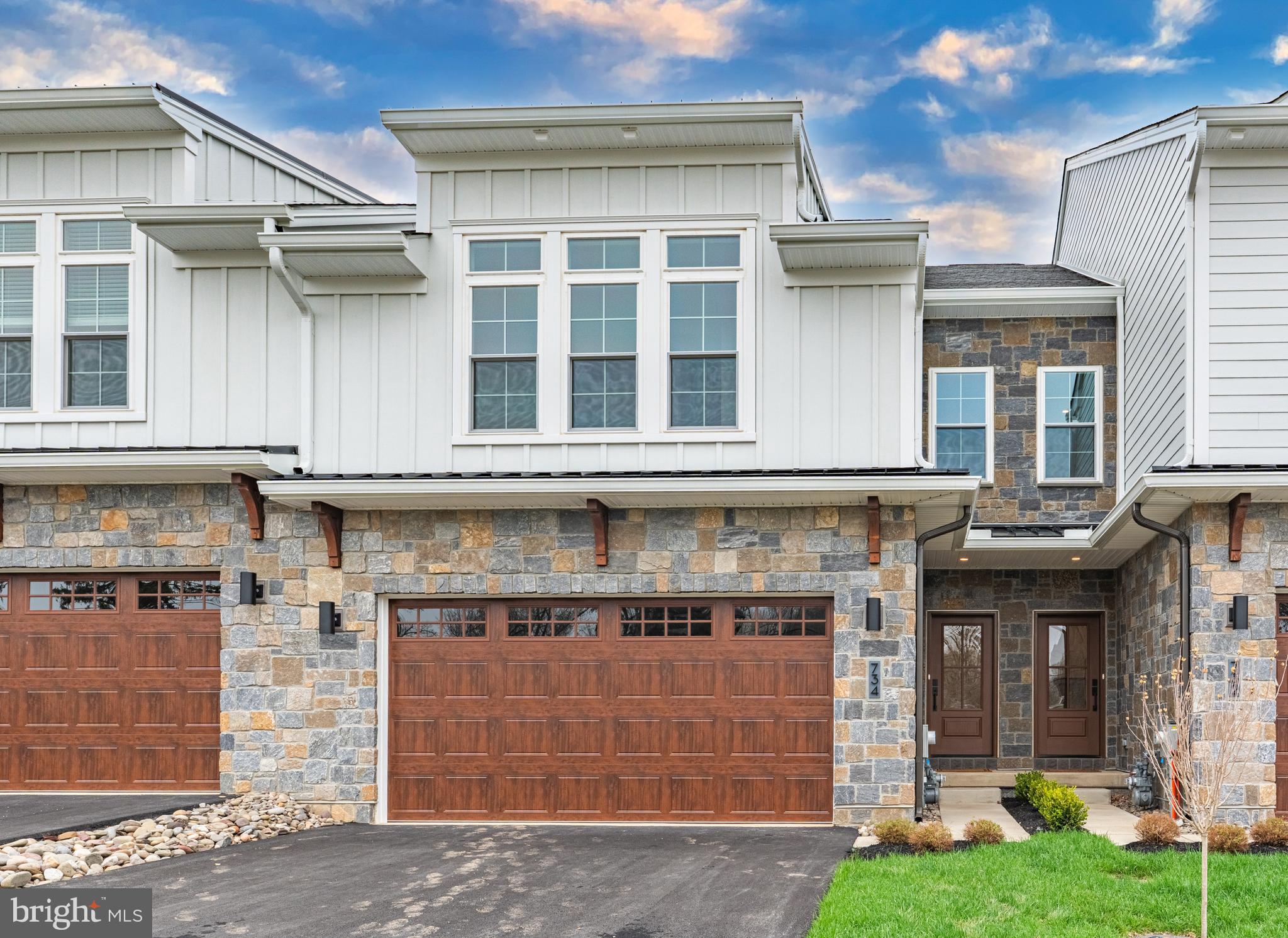*****Preserve at Maple Glen******* Welcome to the Cade model home on Lot 4, a beautifully designed home showcasing thoughtful upgrades, timeless finishes, and a layout that balances everyday comfort with elevated style.
From the moment you enter, you’ll notice the attention to detail—wide-plank flooring in a soft, natural tone, custom trim work, and a bright, open layout that feels both inviting and refined. The great room is anchored by a sleek linear gas fireplace with a custom tile surround and tailored millwork for a clean and modern finish.
The kitchen is designed with both style and function in mind, featuring two-tone cabinetry, quartz countertops, a handcrafted tile backsplash, and a suite of high-end appliances with designer finishes. An apron-front sink and brushed gold fixtures add a refined, modern touch.
Upstairs, the owner’s suite offers a true retreat with custom trim detailing, a spacious layout, and a beautifully finished, fully customized walk-in closet. The spa-inspired bath is a standout, featuring a wet room design with a freestanding tub, frameless glass shower, and elevated tile selections. Additional bedrooms, with walk in closets,  a full hall bath, and convenient upper-level laundry complete the second floor.
Enjoy outdoor living on the covered 16’ x 14’ deck—perfect for relaxing or entertaining. Additional highlights include upgraded stair railings with white oak accents, 7’8” interior doors, extensive recessed lighting, custom closet systems, and a zoned HVAC system with humidifier for year-round comfort .
Set in a serene location with easy access to shopping, dining, Route 309, and the PA Turnpike, this is a rare opportunity to own a fully upgraded model home without the wait.