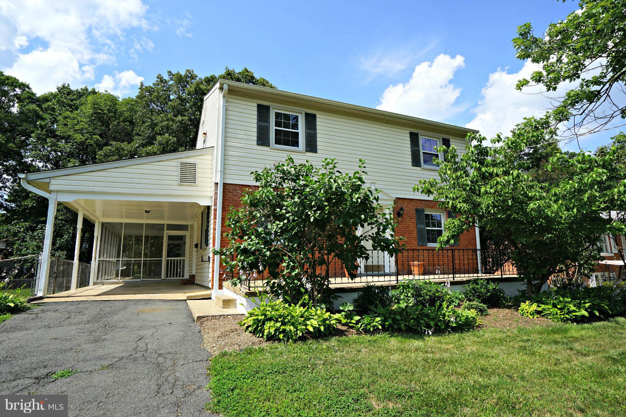 3 finished level colonial * Hardwood floors throughout - just refinished * Family room w fireplace * Kitchen * Formal liv rm and din rm * 4 Br up * Baths updated * Finished walk-up lower level w rec room, half bath, laundry and storage * Screened porch * Carport and driveway * Large fenced yard * Many updates throughout * HSA Home warranty available