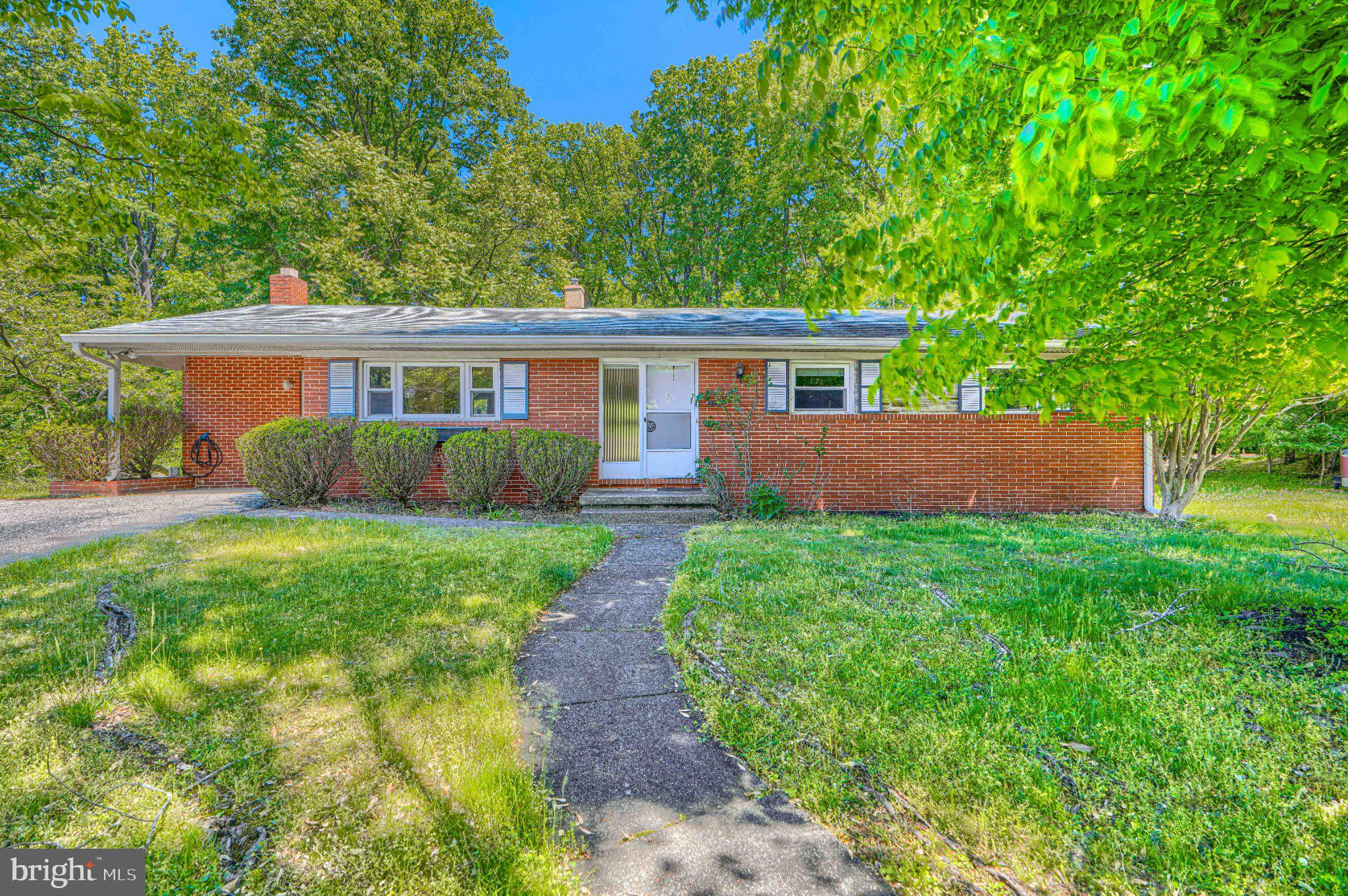 Major Price Reduction!!!!    
Updated Pictures, Seller's Personal Items have been moved!  4 BR, 3BA brick ranch located at the end of a quiet cul-de-sac. The primary suite includes a spacious Bathroom with a soaking tub, a separate shower, and a large 2-sink vanity. The primary bedroom has 2 walk-in closets.  The bright living room/dining room with vaulted ceiling leads to a large 23' x 15' deck overlooking the tree-lined backyard. Cozy family room with a fireplace. The finished basement includes a full bathroom, a bedroom, and a Large finished Rec Room. There is a walkout to a screened patio from the basement. Carport has an EV charger. 2 Separate Furnace/AC systems. Sold As-Is.