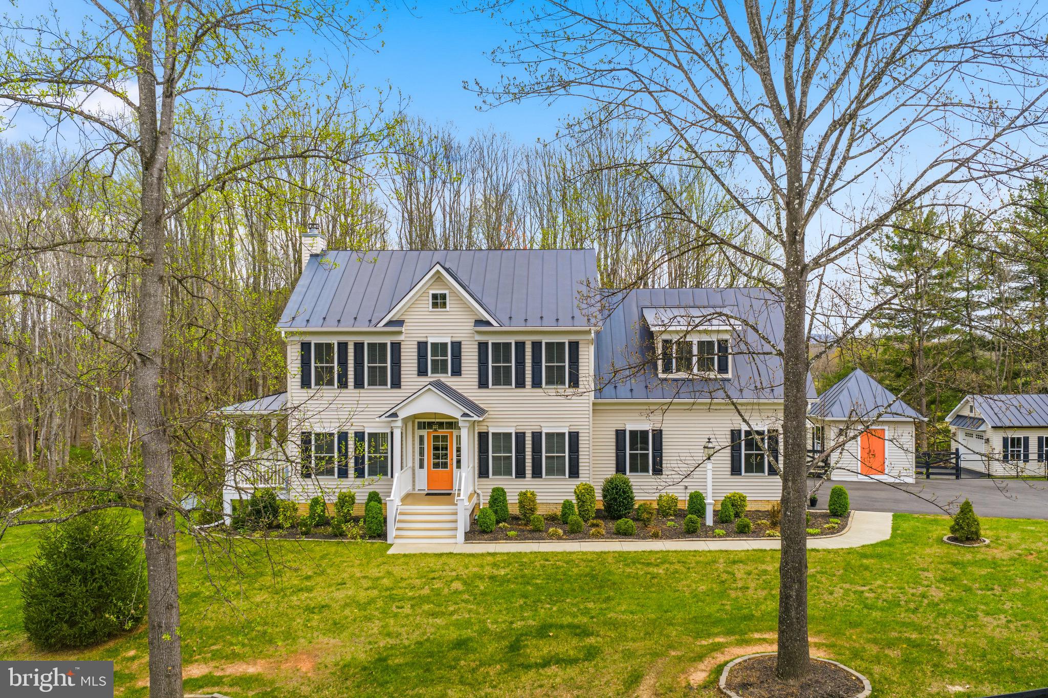 This exquisite Colonial-style residence, built in 2019, offers a harmonious blend of modern amenities and classic design. Spanning 2,846 square feet, the home features four spacious bedrooms and 3.5 well-appointed bathrooms, ensuring ample space for both relaxation and entertainment. The fully finished daylight basement, complete with a walkout entrance, provides additional living space and versatility. Exterior highlights include a meticulously maintained 1.95-acre lot, enhanced by flood lights and a comprehensive gutter system. The property boasts a personal above-ground pool, securely fenced for privacy and safety. A generous deck invites outdoor gatherings, while the presence of both an attached and detached garage offers abundant parking and storage solutions. Additional structures, including a second garage and shed, further enhance functionality. This residence is a perfect opportunity for those seeking a blend of comfort, style, and outdoor living.  Some photos have been virtually staged.