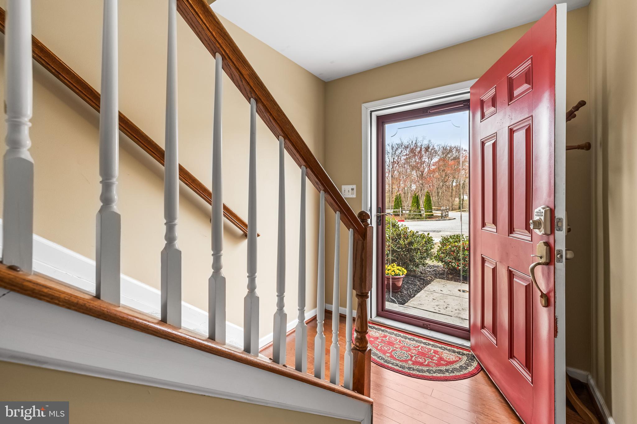 Welcome to your dream home! This charming colonial townhouse, offers a warm and inviting atmosphere, perfect for creating lasting memories. This thoughtfully designed living space, features three spacious bedrooms, and 2 1/2 bathrooms ensuring comfort and convenience for all. Walk in the front door to the beautiful fully finished lower level. This level offers a family room, exercise room, or an office space with access to the garage. Walk up the staircase to the main level and discover a beautifully open floor plan that seamlessly connects the kitchen and dining area, ideal for entertaining guests! The heart of the home is the kitchen. Featuring gorgeous granite countertops, beautiful crowned cabinets, stainless steel appliances, and a cozy island in the center, this area invites a delightful space for culinary adventures. Enjoy the relaxing dining area off of the kitchen after dinner. Head upstairs to the fully carpeted bedrooms.  The spacious bedrooms all offer ample closet space, and, a  walk in closet in the primary bedroom. The primary bedroom also offers a private bathroom with a walk-in shower, and double vanity sink.  The exterior of the home is equally appealing, featuring well-maintained landscaping,  sidewalks, and exterior lighting that enhances the inviting curb appeal. Nestled in a peaceful cul-de-sac with no thru traffic, the property offers a serene rear yard and a charming front yard, perfect for outdoor relaxation and company with family and neighbors.  Additional highlights include a convenient main floor laundry, a garage with inside access, and ample parking with two assigned spaces. The community benefits from included maintenance services, ensuring a hassle-free lifestyle. With lovely garden views and a welcoming ambiance, this property is not just a house; it's a place to call home. Don’t miss the opportunity to make this delightful townhouse your own!