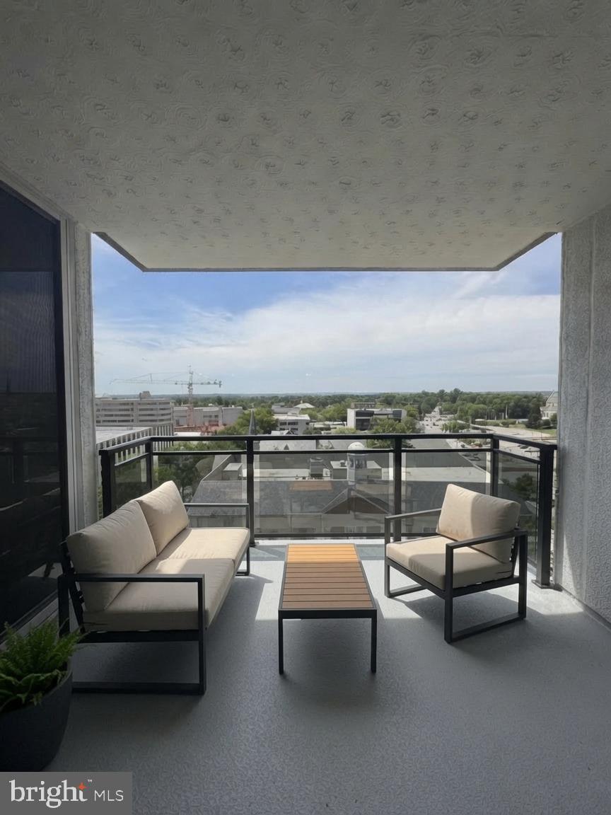 Take advantage of this opportunity to own this dual zoned condominium in the heart of  downtown Towson.  Zoned for residential or commercial use, this property offers flexibility for an owner-occupant, a professional office, or a residential rental.  The open floor plan features 2 brand new sets of sliding glass doors.  The bedroom/second room also has a newly added glass panel allowing maximum natural lighting.  This feature is truly one of a kind in this building. A brand new PTAC heating and air-conditioning wall unit is another plus.  These new items alone are valued at $15k.  Be the first to relax and enjoy the breathtaking sunsets from the 9' x 11' private balcony with its new luxurious railing.  No car is needed because the location is minutes from a large variety of restaurants, shopping, movies, entertainment, colleges, hospitals, and the business district.  This property offers unmatched convenience.  Whether you are looking for a stylish place to live, work or invest, this condo offers plenty of possibilities in one of Towson's most desirable locations.  Building amenities include 24/7 concierge, 24/7 fitness room, heated outdoor swimming pool overlooking Towson, on-site management, trash chute on each residential floor, sprinkler system in each condo and common areas, and access to garage parking (for a monthly fee).  Schedule your showing today and be the one to own this rare find.
