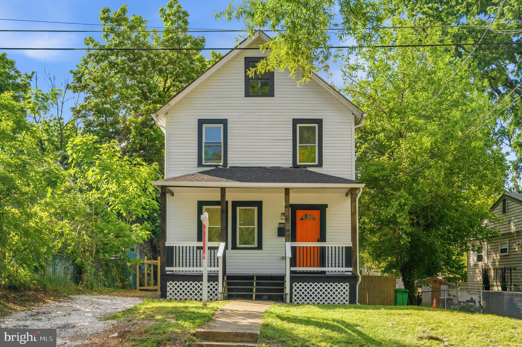 Beautifully renovated and full of character, this 3 bedroom, 3 full bath home blends timeless charm with modern style. Warm wood floors flow throughout the inviting interior, while exposed beams add a touch of historic appeal and architectural interest. The fully updated kitchen features brand new stainless steel appliances, sleek finishes, and a seamless connection to the dining area, creating an ideal layout for everyday living and entertaining. Recessed lighting and contemporary fixtures bring a fresh, polished feel to every room. The spacious lower level and thoughtfully updated baths provide comfort and flexibility for guests, work-from-home space, or multi-generational living. Enjoy outdoor gatherings on the rear deck overlooking the large fenced backyard surrounded by mature trees that offer privacy and natural beauty throughout the seasons. A move-in ready gem combining modern updates with classic character in a peaceful setting.