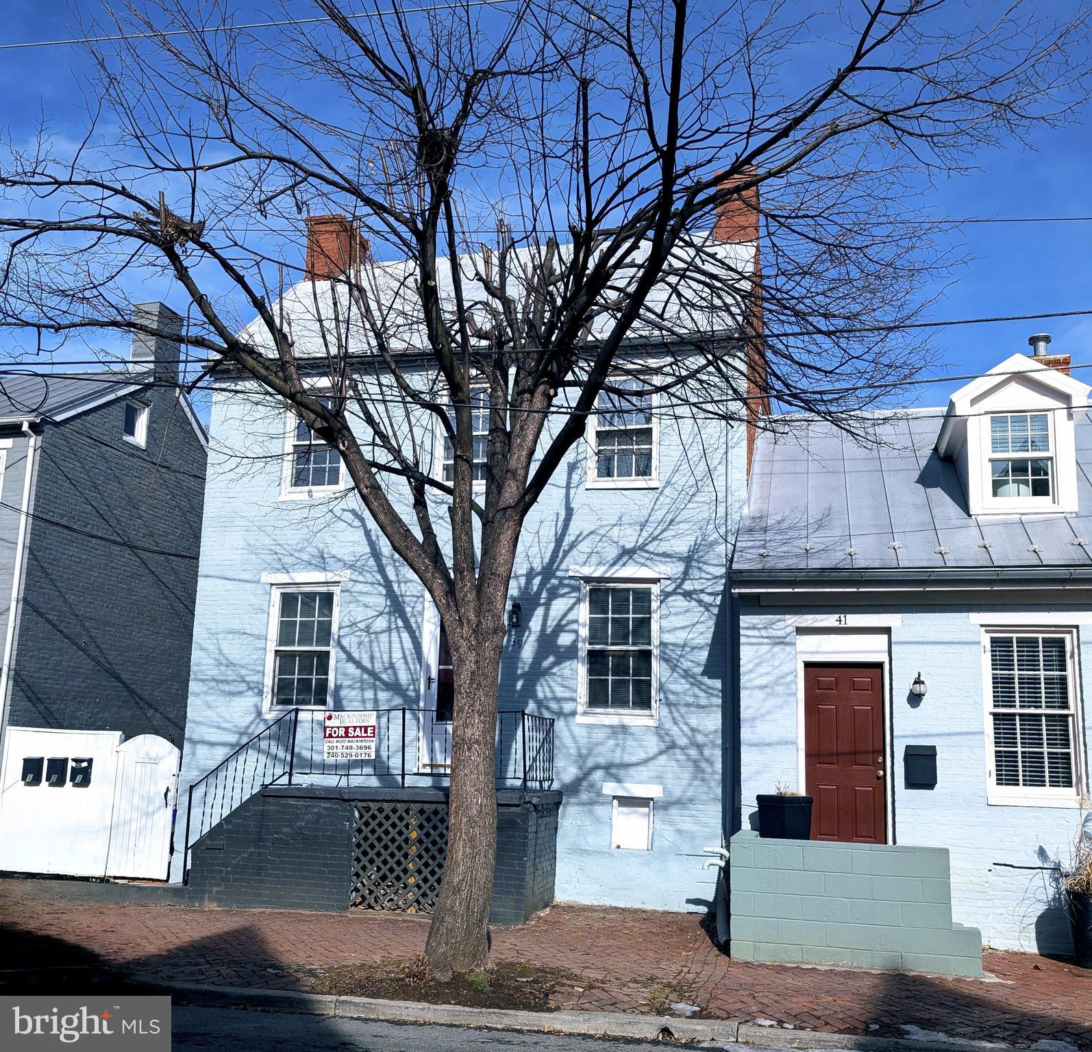 INVESTOR ALERT: Large lot has development potential to subdivide two TH lots or a duplex lot in the rear off Maxwell Alley.  3 unit multi-family, Two , 2 Bedroom 1 Bath renovated units include kitchen w/ stainless steel appliances, granite counters, stacked washer/dryer, luxury vinyl plank floors,  updated : hot water heater & HVAC (2022) in UL, Mini split system & hot water heater installed (2022) in LL. Both units are vacant,  ideal opportunity to live in one unit / rent the others. One 1 BR , 1 Bath unit recently renovated and currently rented month to month w/ long term tenant @ $800 a month. New  asphalt shingles on rear , front metal roof painted ,and new new gutter system installed Dec 2024.  Large lot includes right of way off Maxwell Alley w/ 3 bay garage , 1 rented mo to mo @ $125 a month w/ long term tenant, 2 other bays owner occupied. Off street parking for 10 + cars / opportunity to rent parking. Large yard affords possible future addition or take advantage of Frederick's ADU ordinance.  Located in the heart of Frederick's Historic District,, near the MARC commuter rail, walk to restaurants, Carroll Creek park and all downtown living has to offer.