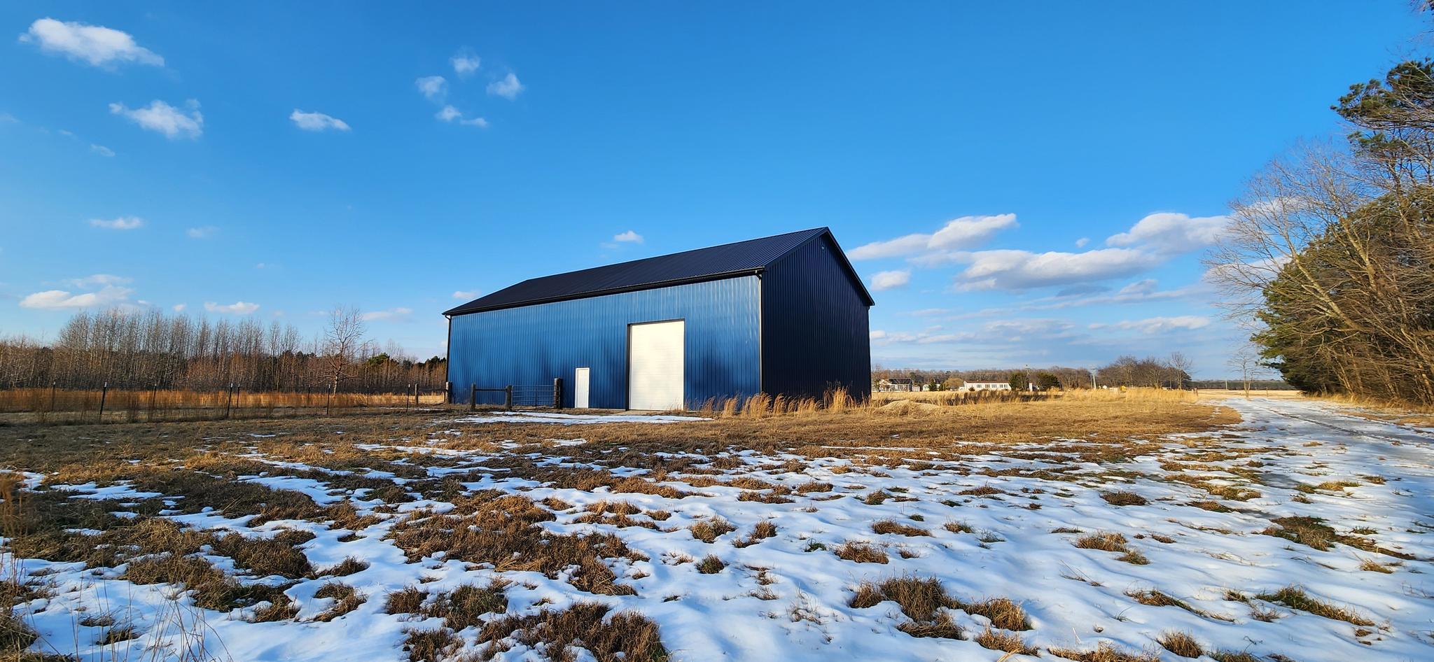 So many possibilities with this great 29.71 acre farm containing 25+/- wooded land, cleared land, and a stream in the back of the property. Brand New 40x80 Pole Building erected in 2025 with 20' walls, 14' overhead door, and standard entry door. Bring your animals and build your own custom built home, subdivide the property or do BOTH. Minor subdivision eligible of up to 4 or 5 lots per County. Due diligence is buyers responsibility. An existing capping fill gravity fed septic and well for a 3 Bedroom home was constructed in 2001 (singlewide previously removed). Neither are in use. Electric is available. Existing line is retired. Consult Delaware Electric Coop regarding potential for reactivation.