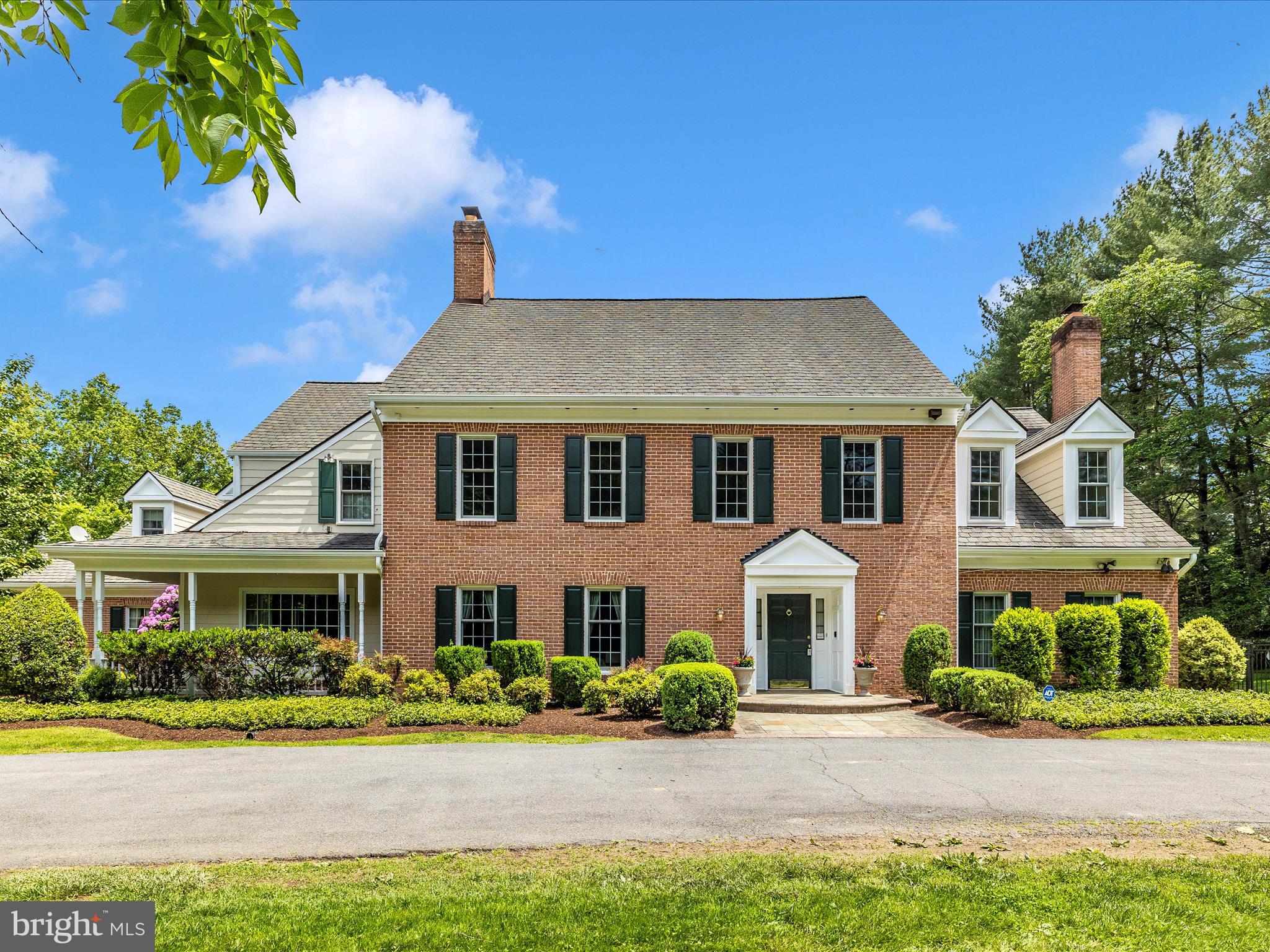 So much square footage for the price! Floor plans are at the end of the pictures so you can envision your new spaces! Nestled on a serene 2-acre lot in Potomac, Maryland, this 8487 square-foot elegant brick colonial embraces you with the tranquility of protected parkland on two sides. Just a short drive to Potomac Village, its prime location offers the perfect balance of privacy and connectivity.

A Grand Entrance and Inspiring Interiors leads to the formal living room featuring a stately fireplace and double French doors that open to a light-filled sunroom with floor to ceiling windows overlooking a lush, meticulously landscaped garden. Adjacent, the formal dining room basks in natural light from glass doors that lead to a flagstone patio—ideal for gatherings. Custom millwork throughout these rooms amplifies the luxurious ambiance, creating spaces that invite both relaxation and refined entertaining.

The Heart of the Home: The kitchen boasts ample counter space, a generous center island, and an adjacent breakfast room for casual meals. The first level also hosts a spacious family room with a brick fireplace, a stately office, and a bonus room with extra storage and convenient direct exterior access.

A Private Retreat Upstairs: Ascend to the second level, where five generously sized bedrooms await, complemented by a versatile laundry room that doubles as a kitchenette. The expansive primary suite impresses with high ceilings, two inviting seating areas, and an adjacent room that can easily transform into an exercise space, office, or additional storage—tailor it to your lifestyle. A walk-up, already framed attic offers exciting potential for extra bedrooms or living space.

Entertainment and Versatility in the Basement: For hosting friends or enjoying quiet evenings, the fully finished basement provides an entertainer’s dream: a pool table, wet bar, and a third fireplace set the stage for lively gatherings. An additional bonus room and a full bathroom provide ample space for guests or hobbies.

Extra Amenities and Outdoor Enjoyment: Parking is a breeze with both a two-car attached garage and a two-car detached garage—the latter topped with a finished area perfect for a separate office. Step outside into your private backyard retreat featuring a large flagstone patio, expansive grassy spaces, and a pool perfect for summer festivities.

Your Ideal Potomac Lifestyle Awaits: Situated just steps from top-rated schools, premier dining, vibrant shopping, and two acclaimed golf courses—with easy access to Washington, D.C.—this home presents an unmatched opportunity. Schedule your private tour today and begin the next chapter of your life in a home that truly defines elegance and comfort.