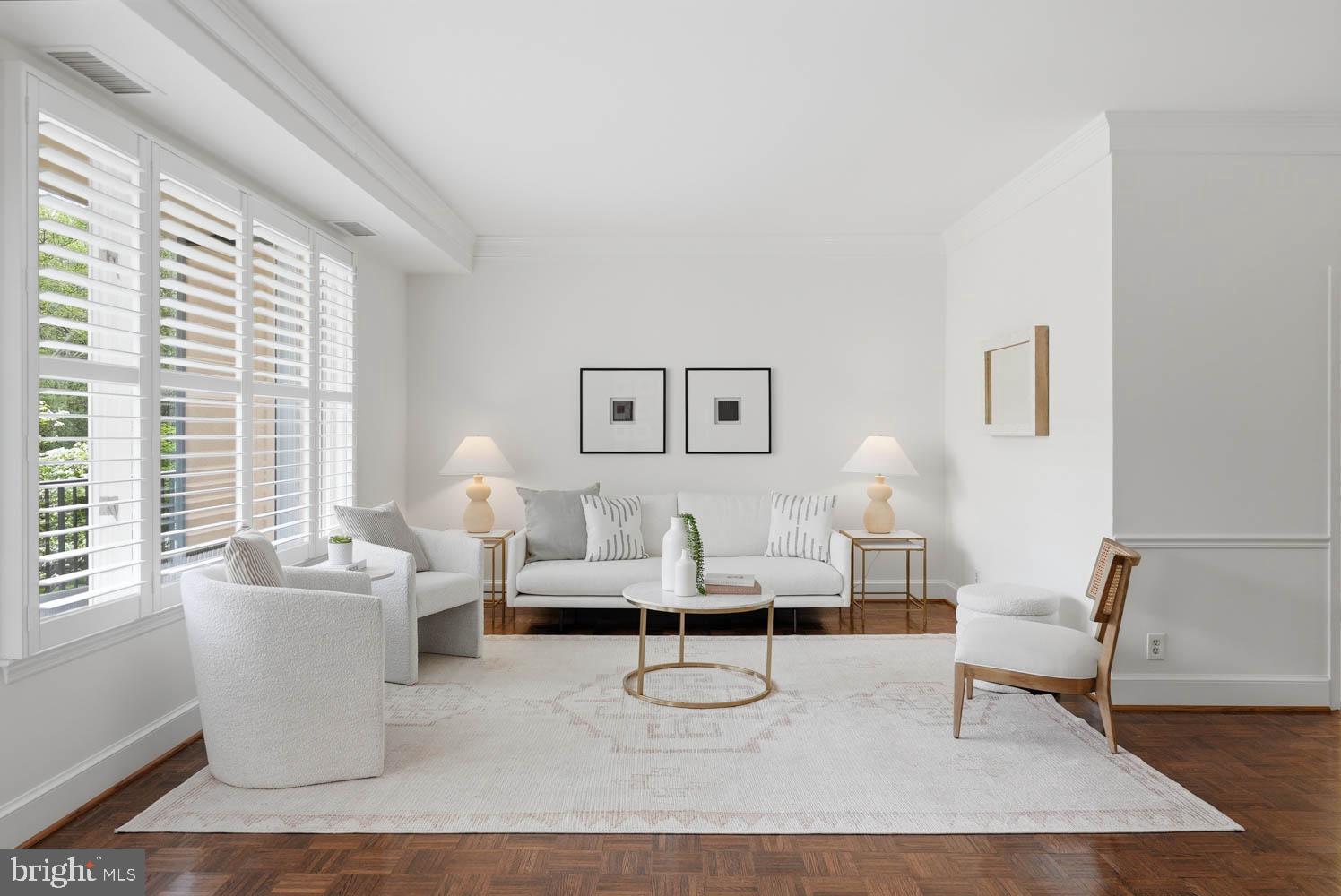 Bright & Spacious Condo in Chevy Chase | 2 Bed | 2 Bath | 1436 Sf | Private Balcony | 1 Parking Space | 2 Storage Units | Welcome to this large, two-bedroom condo with an open floor plan and 9 foot ceilings.  Enter through a gracious foyer into a large living room with adjoining private balcony overlooking the beautiful & quiet community gardens.  The large primary bedroom has a renovated ensuite bath with two separate sinks and a shower with frameless glass enclosure & bench.  Off the primary bath is a large walk-in closet.  The second bedroom in the unit can also serve as a den with double doors that open to the living area.  This bedroom has easy access to the hall bath and in-unit washer/dryer.  The unit offers over-sized windows with custom interior wood shutters, lots of natural light, gleaming wood floors, and abundant closets.  One garage parking space and two storage spaces are included.  The unit’s entrance has very easy access to the elevator, as well as to the garage parking space.  The building offers 24-hour front desk, guest parking in the outdoor lot, and bicycle storage.  This location offers great access to the shops & restaurants of Chevy Chase Lake, the future Purple Line station, Capital Crescent & Rock Creek Park Trails, I-495, as well as to downtown Bethesda.