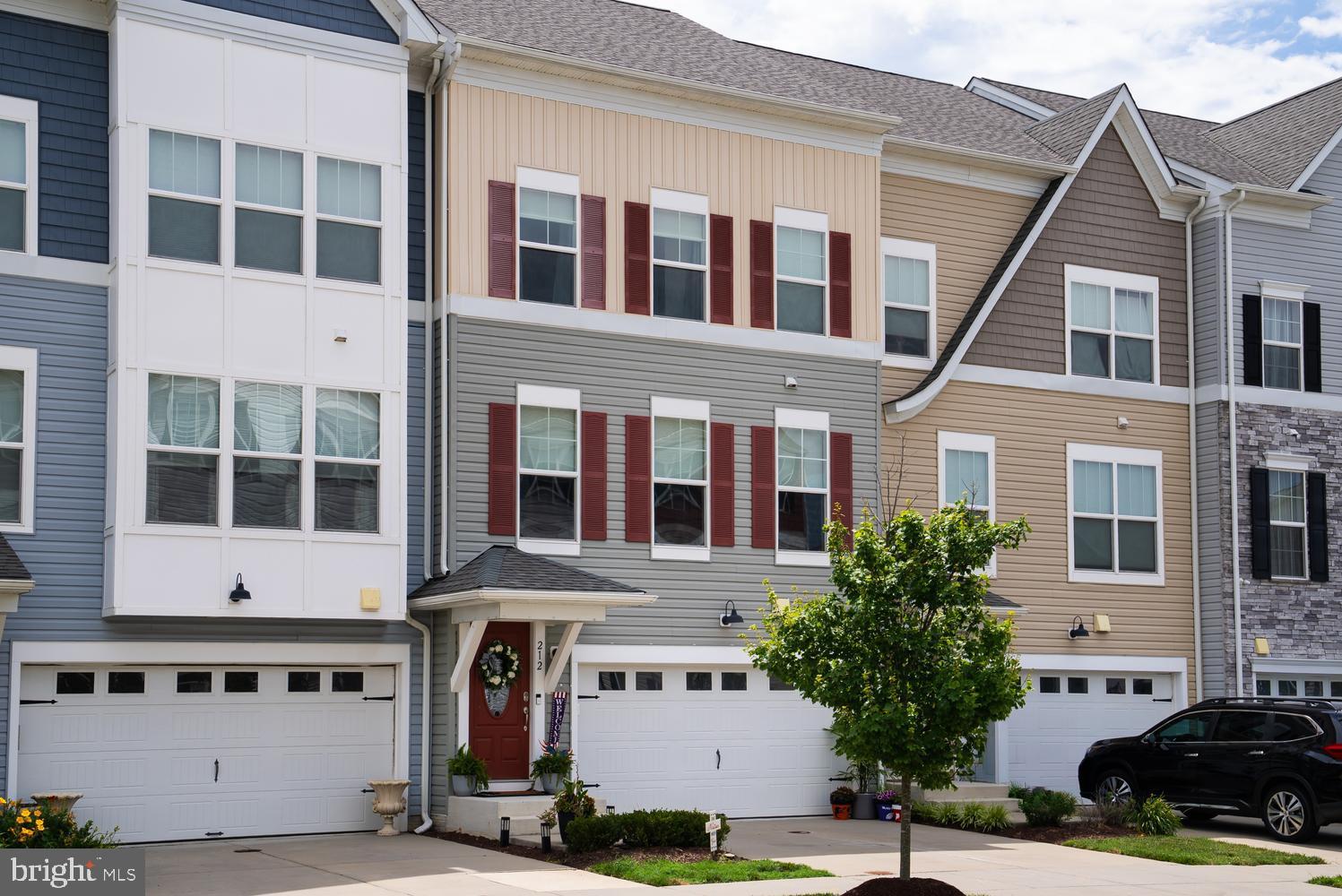 Beautiful Upgraded Townhome in a Prime Location

Enjoy the perfect blend of space, style, and convenience in this exceptional four-level townhome, ideally located for easy commuting and close to shopping, dining, and everyday essentials.

This spacious home features numerous upgrades, including a stunning oversized kitchen island, quartz countertops, designer backsplash, stainless steel appliances, and luxury vinyl plank flooring throughout the main living areas. The open-concept layout offers abundant living space, with a large living room and dining area that comfortably accommodates six or more guests.

A unique fourth-floor level provides incredible flexibility, making it ideal for a home office, guest suite, or potential fifth bedroom. This level includes its own full bathroom, living area, and walkout deck, creating the perfect private retreat. At entry level this town house has a finished bedroom and bath which is unique, most units don't have a finished bedroom and bath.

With 4.5 bathrooms, this home is designed for comfort and convenience. The laundry room is thoughtfully located on the bedroom level, making everyday living easier.

Additional highlights include:
- Four level of living space that feels more like a single-family home.
-Spacious primary suite and generously sized bedrooms.
-Two car Garage plus, two car parking pads.
- Modern finishes and upgrade throughout.

Residence enjoys outstanding community amenities, including a community pool, kayak storage, and a pier for water enthusiasts. Conveniently located near target, food lion, and Starbucks, restaurants, and other popular retailers, this home offers everything you need just minutes away.

Don't miss the opportunity to own this beautifully upgraded townhome with exceptional space, flexibility, and amenities in a highly desirable location.