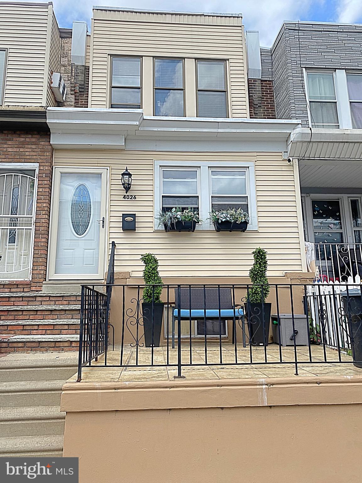 MOVE IN READY!!!!!! In sought out Juanita section of Phila., This home incudes a nice curb appeal with a front patio, just in time for your summer gatherings. Entering this inviting, generous sized  home you will first be greeted with an enclosed porch which includes a large coat closet. Original stained glass windows welcome you into the good sized living and dining rooms, leading to a large eat in kitchen. Upstairs you'll find a spacious master bedroom, 2 additional bedrooms, a full bath and a hallway closet. Clean basement includes walkout to back of home and a one car garage. Home is being conveyed in as is condition. Schedule your private tour today!!!!