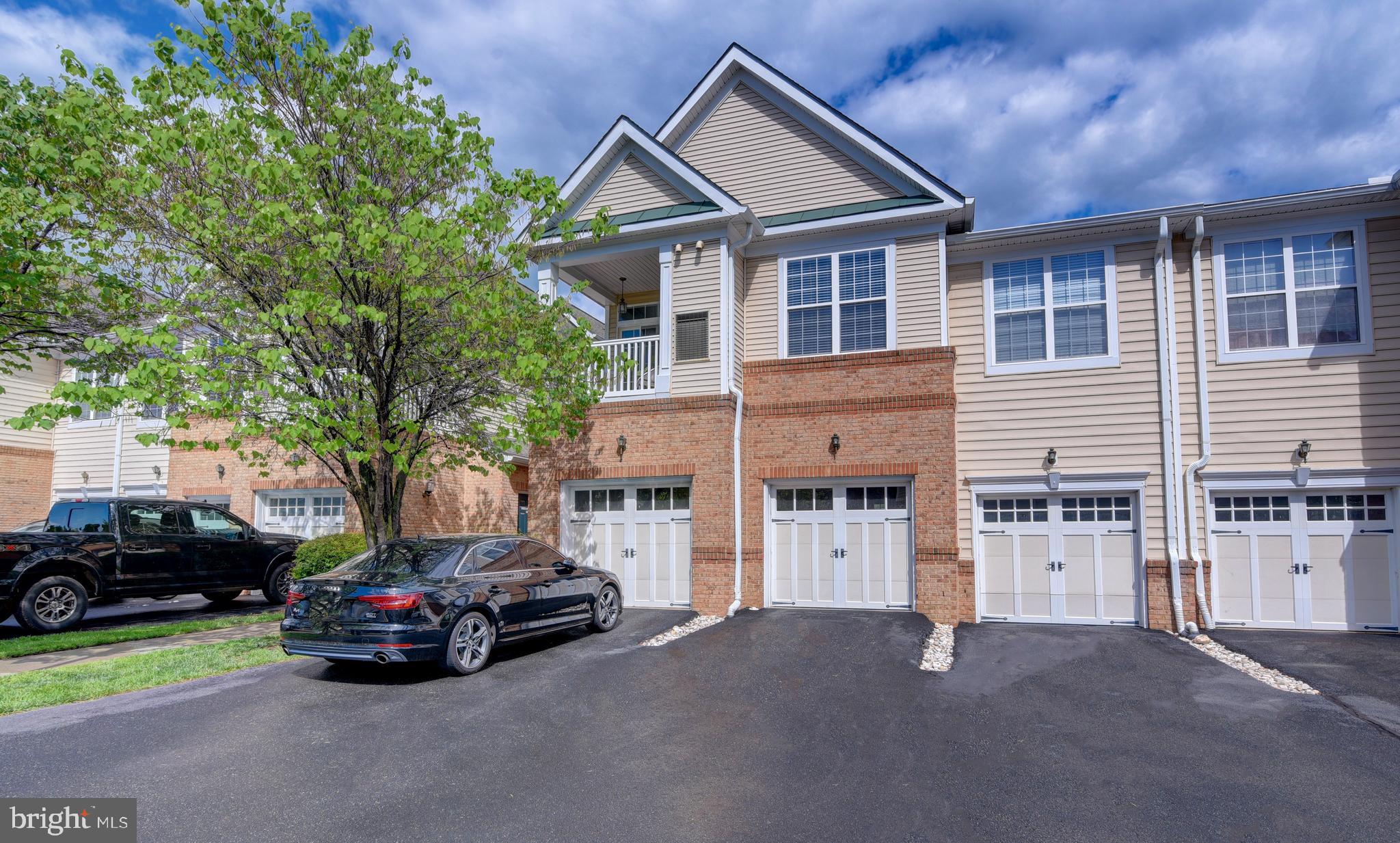 Welcome to 43920 Hickory Corner Ter UNIT 109 a spacious and well-appointed 3-level townhouse in the heart of Ashburn! This beautifully maintained home offers a functional and open layout perfect for comfortable living and entertaining.

The main (middle) level features an expansive open-concept design that seamlessly connects the kitchen, dining, and living areas, making it ideal for hosting or relaxing. You'll also find a half bath, closet space, access to the one-car garage, and the front door entrance on this level. Step out onto the balcony to enjoy a breath of fresh air or a peaceful morning coffee.

Upstairs, the top floor boasts two generously sized bedrooms with ample closet space, along with a full bathroom and a conveniently located washer and dryer. Natural light floods the rooms, enhancing the cozy yet bright atmosphere.

The lower level offers incredible flexibility, with a large full bathroom and direct walkout access to the private patio. This space can easily serve as a third bedroom, guest suite, home office, or rec room.

Additional highlights include abundant storage throughout the home, excellent natural lighting on all floors, and ample parking for both residents and guests. Situated in a prime Ashburn location, the property offers quick access to grocery stores, shopping centers, parks, and everyday necessities.

Don't miss the opportunity to live in this inviting home that combines space, style, and convenience.