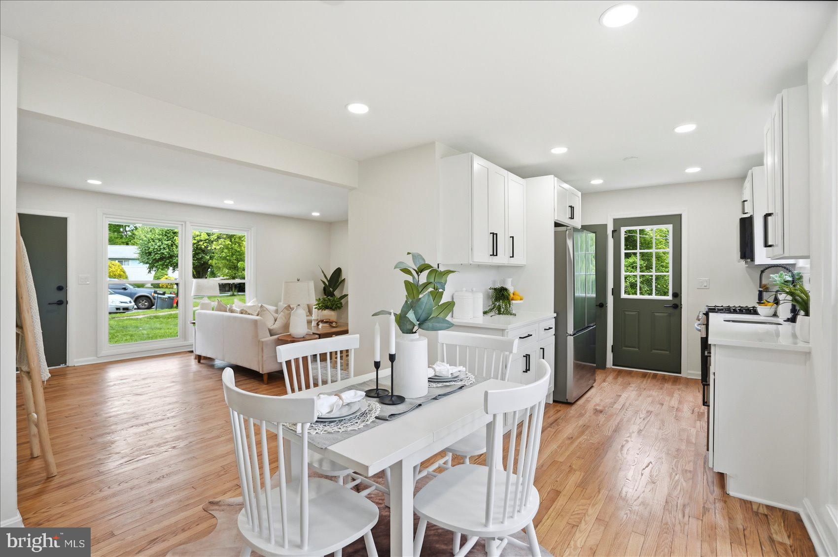 Beautifully renovated 5-bedroom, 2 full bath rancher located in the desirable Joppa Manor community! From the moment you arrive, you’ll appreciate the charming covered front porch — the perfect spot to relax with your morning coffee. Step inside to find massive windows that fill the home with an abundance of natural light, creating a warm and inviting atmosphere throughout.

The main level showcases beautiful hardwood floors and an updated kitchen featuring gas cooking, stainless steel appliances, modern cabinetry, and ample prep space for everyday living and entertaining. Three generously sized bedrooms and a full bath complete the main level.

The fully finished lower level expands your living space with a large family room ideal for movie nights, gatherings, or a play area. Two additional bedrooms with plush carpeting and a second full bath provide flexibility for guests, a home office, gym, or multi-generational living.

Outside, enjoy the fully fenced rear yard offering privacy and plenty of room for outdoor entertaining, gardening, pets, or play. Conveniently situated near shopping, dining, schools, and major commuter routes for an easy commute. Just minutes from the Woodcroft Pool, perfect for enjoying summer days close to home. This move-in ready home offers space, comfort, and modern updates all in one!