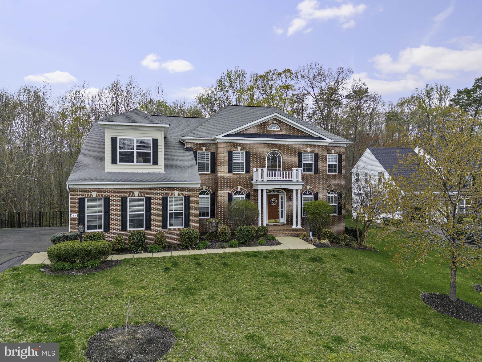 She is absolutely Gorgeous! Come and see this very well maintained 5 Bedroom, 4 full bath and a half Traditional style Colonial situated in a cul-de-sac on an acre plus. Kitchen offers upgraded counter tops, top of the line appliances, double wall oven, microwave, KitchenAid downdraft cooktop in island, ample 42" maple cabinetry and a very nice breakfast room. Going upstairs, an elegant spacious Owners suite awaits you, with 2 sitting areas, a cozy double-sided fireplace, 3 closets (ladies) and to touch the room off with a wet room. The 2nd bedroom has its own full bath, the 3rd and 4th share a jack and jill bath with their own separate vanities. As you go downstairs you are greeted with a huge recreational area with wet bar and fitness room, the 5th bedroom with a full bath. Out back you have generous decking for your family and friends' enjoyment. You will always have your privacy as no homes will be built behind you as it is an environmentally protected wetland.
This is an amazing home that you must come and see to appreciate all that it will offer our next family! Sellers to find a HOC.