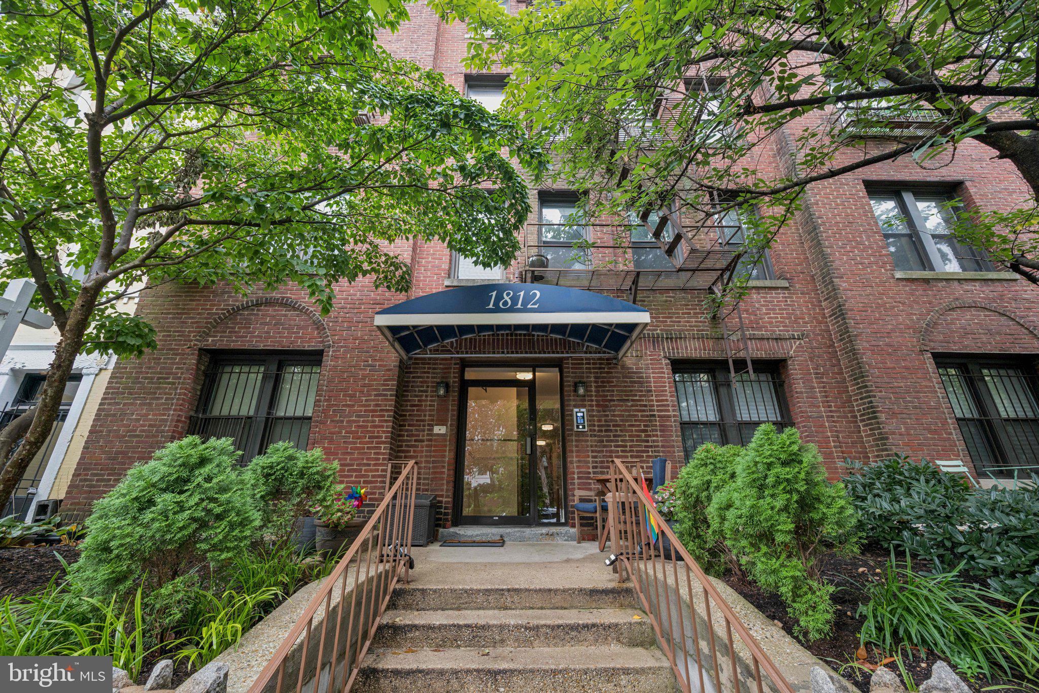 Light-filled Elegance and Historic Charm, this beautifully updated corner residence is perched on a quiet, tree-lined one-way street and offers sweeping leafy views with an abundance of natural light. Featuring two bedrooms and one bath, the home boasts soaring ceilings, all new windows, and a thoughtfully designed open layout. The pass-through kitchen is appointed with stainless steel appliances, granite countertops, and ample cabinetry—while the in-unit washer and dryer add everyday convenience. Built in 1918, The Carswell is a boutique condominium that masterfully blends historic character with welcoming enhancements like a front porch, landscaped gardens, and mature blooming trees. Residents enjoy unrivaled access to Kalorama, Adams Morgan, Dupont Circle, and U Street—and are just steps away from world-class dining, shopping, and entertainment. With Dupont Station just 0.6 miles away, the Metro is within easy reach. There’s also options galore when it comes to recreation: Marie Reed Recreation Center, Rock Creek Park, the National Zoo, S Street Dog Park, and Meridian Hill Park are all just seconds away. Whether savoring the quiet charm of Vernon Street or the vibrant energy of 18th Street just around the corner, this residence offers the very best of city living in a truly timeless setting.  Also listed for rent MLS# DCDC2216262.