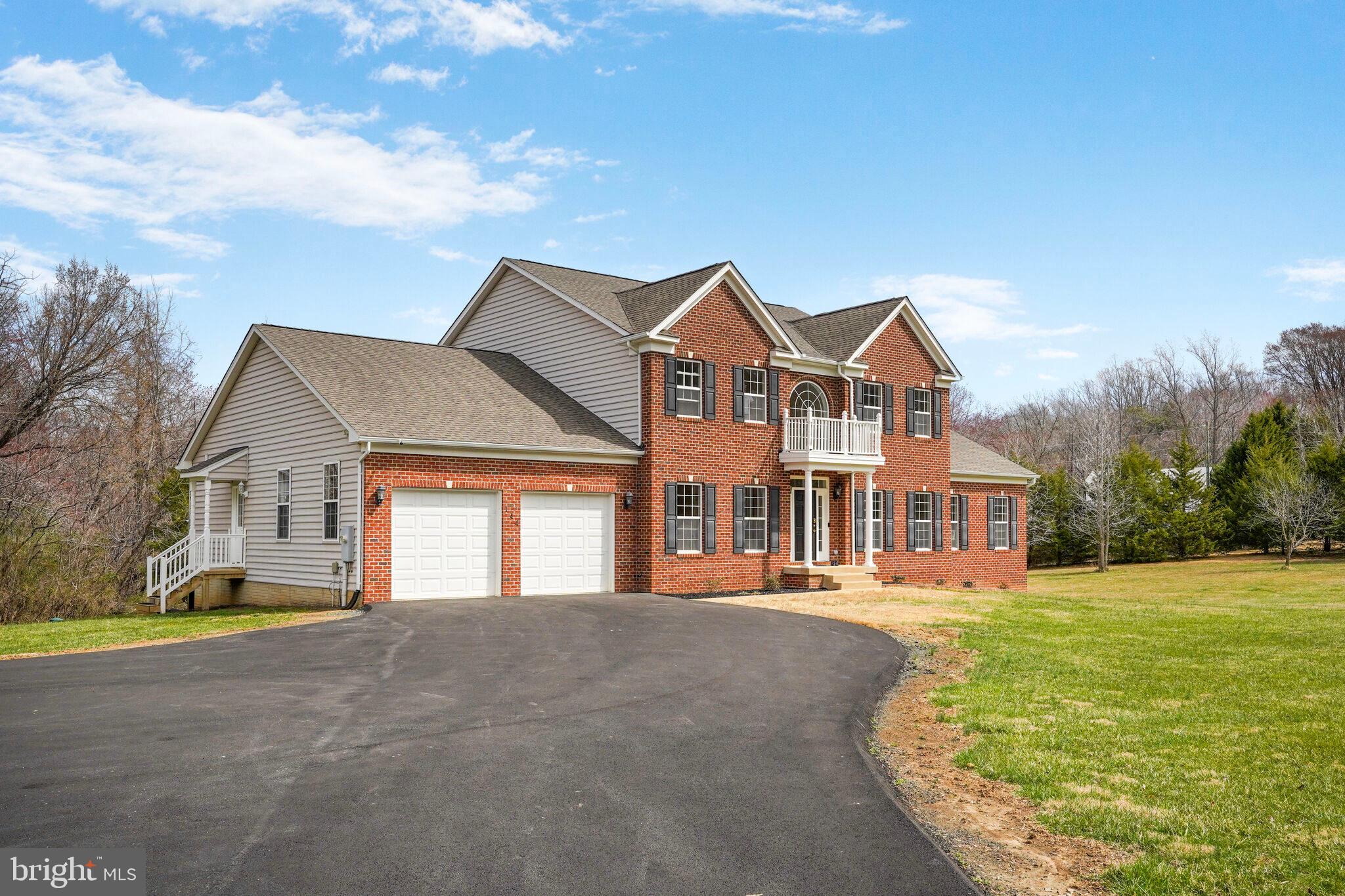 This beautifully appointed custom-built Colonial, totaling more than 6,500 square feet, is situated on an impressive 3.6-acre, serene, private lot. Yet, it is conveniently located close to shopping, restaurants, a sought-after school system, and major commuting routes.


The home offers a thoughtfully designed open floor plan with wide doorways and hallways. The main level features exquisite Brazilian cherry hardwood, a two-story family room with a gas fireplace, an office with a magnificent view, a gorgeous gourmet kitchen with abundant maple cabinets, two pantries, a vast island with bar seating, and an eat-in breakfast area.


The primary bedroom is on the main level. It has a tray ceiling, two spacious walk-in closets, and a beautifully renovated luxury salon bathroom.


In addition, there’s an EV/NACS charger in the oversized 24x22 garage, a generator that runs off a gas line to the 1000-gallon buried propane tank, and a three-zoned HVAC.


The bright walk-out basement has a huge, finished media/hobby room, two full-sized windows, and plenty of space for a fifth bedroom. Rough-in plumbing is already in place, ready for a fourth full bathroom and a wet bar. There’s also abundant additional space to finish a spacious recreation room, exercise room, and second office. The possibilities are endless.