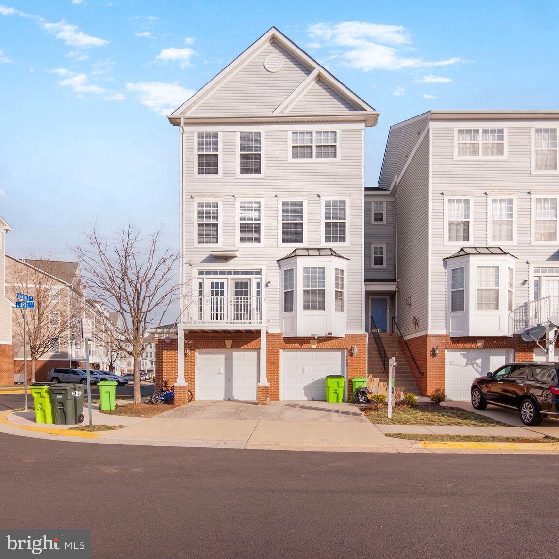 Welcome to this beautifully upgraded, four-level townhome offering 3 bedrooms and 2.5 bathrooms in a prime Herndon location. Thoughtfully updated with modern finishes and high-end upgrades, this home is truly move-in ready!

The main level features a bright and open family room with crown molding, a large bay window, gleaming hardwood floors, high 9’ ceilings, and a cozy gas fireplace. The upgraded kitchen boasts recessed lighting, granite countertops, a stylish tile backsplash, stainless steel appliances, and a pantry. The dining area features beautiful chair rail and wainscoting molding and a french door opens to your balcony, conveniently updated and maintained, perfect for relaxing or entertaining.

The second level features two spacious bedrooms, both freshly painted in a neutral tone, along with a full bathroom with a tub-shower combination. Upstairs, the private primary suite offers a tranquil retreat, complete with fresh paint, a tray ceiling, and a large walk-in closet featuring custom bamboo flooring and built-in organizers. The spa-like en-suite bathroom boasts a soaking tub, upgraded glass shower door, dual sink vanity, and a private water closet. For added convenience, the laundry is also located on this level.

Throughout the home, sleek black fixtures add a modern and sophisticated touch, complementing the thoughtfully upgraded design. Enjoy the convenience of updated appliances, including a refrigerator, dishwasher, microwave, and range—all replaced in 2018. The HVAC and hot water heater are less than two years old, and an extra freezer that conveys was added in 2021. Efficient natural gas heating ensures year-round comfort. The entry-level features a front-load garage, a driveway parking space, and an additional community parking pass for added convenience.

Ideally located for convenience and connectivity, this home is just minutes from the Dulles Toll Road, Route 28, Route 50, and the Silver Line Metro, making commuting effortless. Dulles Airport, Reston Town Center, and Clock Tower Shopping Center are all nearby, offering endless shopping, dining, and entertainment options. Situated right across the street from the community park, complete with a playground and gazebo, this home provides a perfect blend of accessibility and neighborhood charm. Whether commuting or exploring all that Northern Virginia has to offer, this home’s prime location ensures everything you need is just moments away.

Don’t miss the opportunity to own this beautifully upgraded and ideally located home!