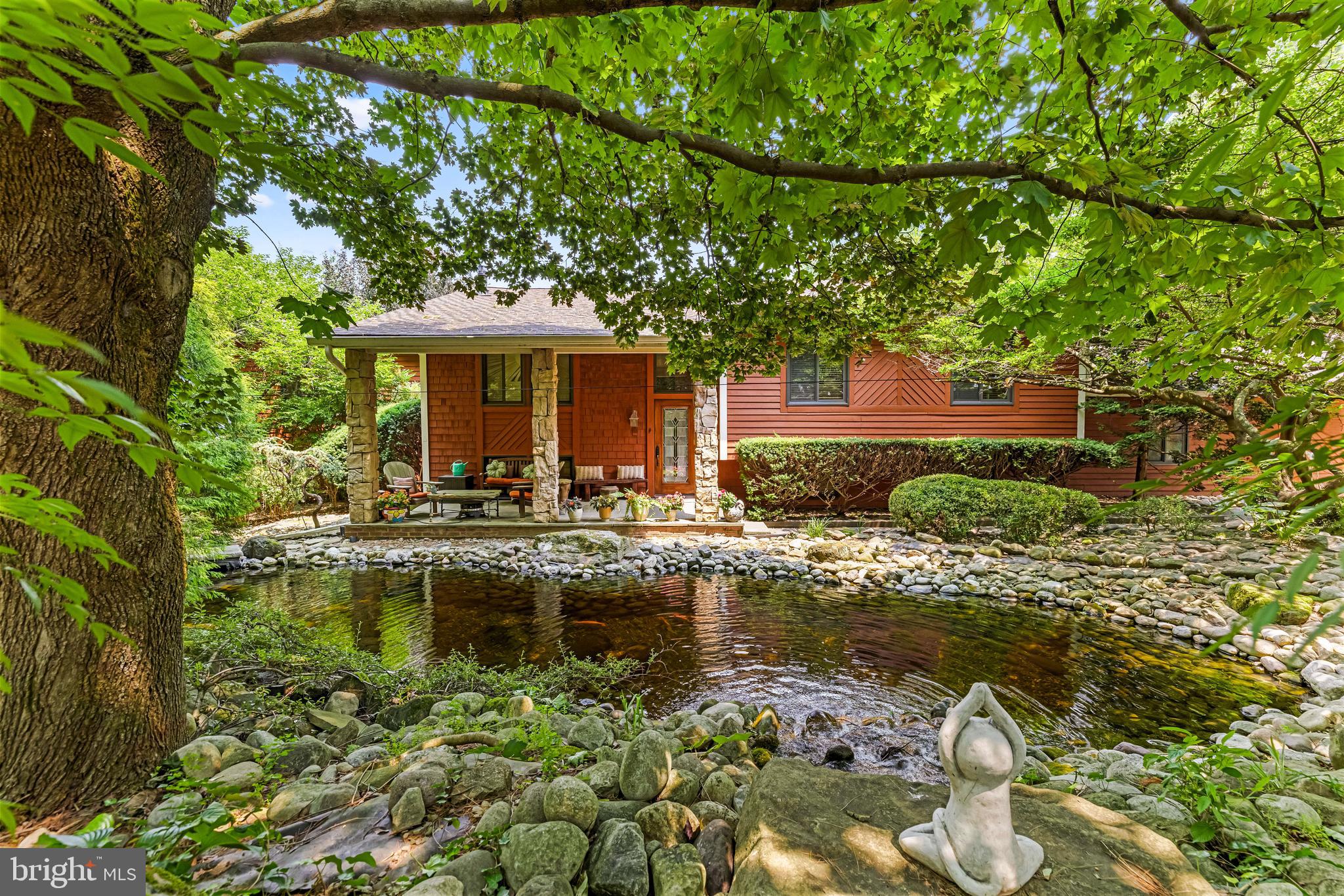 Set in a private, park-like setting with a resort feel, this one-of-a-kind 4–5-bedroom home offers comfort, privacy, and impressive amenities. A large front porch overlooks a koi and goldfish pond with waterfalls, creating a serene first impression. Highlights include a heated saltwater pool, an expanded kitchen that opens to the family and dining rooms, direct interior access from the two-car garage, and beautiful landscaping throughout the 1.3-acre property. The primary bedroom suite features two walk-in closets, hardwood floors, an ensuite bath with a whirlpool tub and steam shower (sold as is - Seller has not used in years), and French doors leading to a hot tub on the rear deck. The deck is also accessible from the kitchen and original primary bedroom suite. The granite and stainless-steel kitchen includes a wall oven, microwave, dishwasher, cooktop, refrigerator with ice maker, instant hot-water dispenser, tile backsplash, breakfast area, and concealed washer and dryer. The living room has a gas fireplace and opens to the dining area. The original bedroom wing includes three bedrooms: a primary bedroom with an ensuite bath, two additional bedrooms, and a full hall bath. The spacious lower level offers a recreation room with a wet bar, second fireplace, generous entertaining space, walkout access to the pool, a powder room, and a fully equipped gym that could serve as a fifth bedroom. From the pool area, a marked path leads to an expansive grassy space ideal for recreation or quiet relaxation. . THIS HOME HAS HAD EXPANSIONS - SQUARE FOOTAGE PER APPRAISER IS 2226 SQ.FT. ON MAIN LEVEL AND LOWER LEVEL  1056 SQ FT.   SELLER PREFERS OCCUPANCY THROUGH OCTOBER 3RD.
Ask the agent for a list of all updates and upgrades. Come see this enchanting home today!
