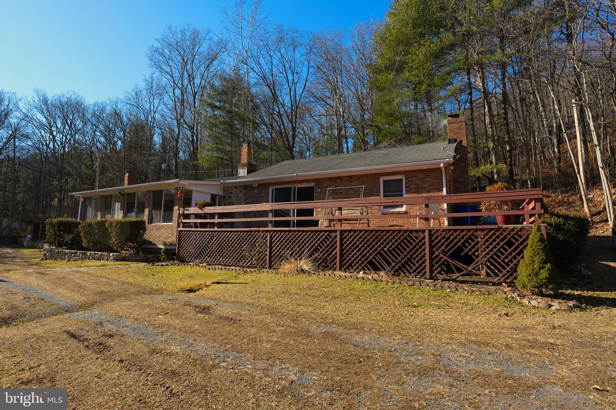 Charming 3-bedroom, 2-bath home situated on a beautiful 3-acre lot. The property features a deck overlooking Manassas Run Creek, which runs through the property, creating a peaceful and scenic setting rarely found this close to town.
With its proximity to Front Royal, Shenandoah area attractions, and major routes, the property also offers strong potential as a short-term rental, weekend getaway, or investment property (buyer to verify intended use). Just minutes from downtown Front Royal and with quick access to Route 66.
Enjoy the convenience of being close to shopping, dining, and services while still feeling tucked away in a quiet, natural setting. With acreage, water features, and an excellent location, this property offers exceptional upside for the right buyer.
Ideal for those seeking a country setting with town convenience and investment potential. This property offers a great opportunity for a buyer looking to add their own finishing touches and build instant equity.