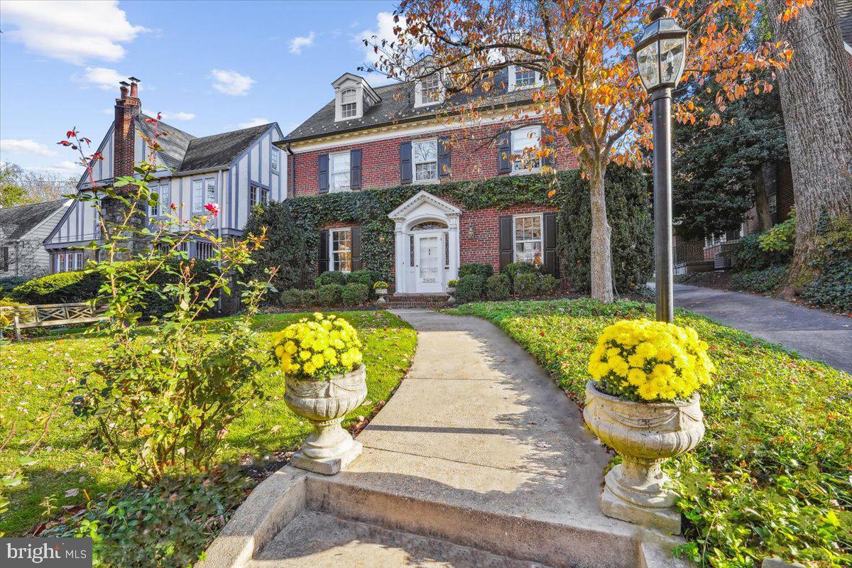 $100,000 price reduction!!!, Now priced at $1,895,000.

The epitome of timeless elegance and luxurious living, 3806 Woodbine St, Chevy Chase, MD 20815. This gracious and sophisticated 5 bedroom, 4.5 bath Classic brick Chevy Chase Colonial is a true masterpiece, boasting a picture-perfect garden and a serene stone patio that will leave you utterly enchanted.

Spanning four meticulously finished floors, this home effortlessly blends original accents and charm with contemporary upgrades, creating an ambiance of unparalleled refinement. Step inside to discover a world of luxury, with expertly crafted moldings, intricate trim work, and an inviting wood-burning fireplace with a classic mantle, perfect for cozy evenings.

The heart of this abode is undoubtedly the superbly renovated gourmet kitchen adorned with exquisite marble counters and a spacious island, a true chef's delight. Each bath in the house has been thoughtfully updated, ensuring modern comfort and style.

Elegance and fine craftsmanship are evident throughout, from the formal living and dining rooms to custom finishes that add a touch of distinction to every corner. With custom built-in bookcases, crown molding, and additional fireplaces, this home exudes luxury from every angle.

Nestled on a sprawling nearly 1/5-acre lot in the highly sought-after Rollingwood Hills of Chevy Chase, this property offers a fairytale setting that is nothing short of enchanting. The landscaped backyard is a secluded oasis, surrounded by towering stately mature trees and featuring a large stone patio perfect for entertaining or simply unwinding in the splendor of nature. Street parking is available, including a detached 1-car garage.

Not only is this residence a haven of elegance, but it also offers abundant convenience. Located a mere 3 blocks from Brookville Market and La Ferme, it places you within steps of Meadowbrook Park, where you can enjoy tennis, basketball, fields, the Candy Cane City playground, and the scenic beauty of Beach Drive/Rock Creek Trail.