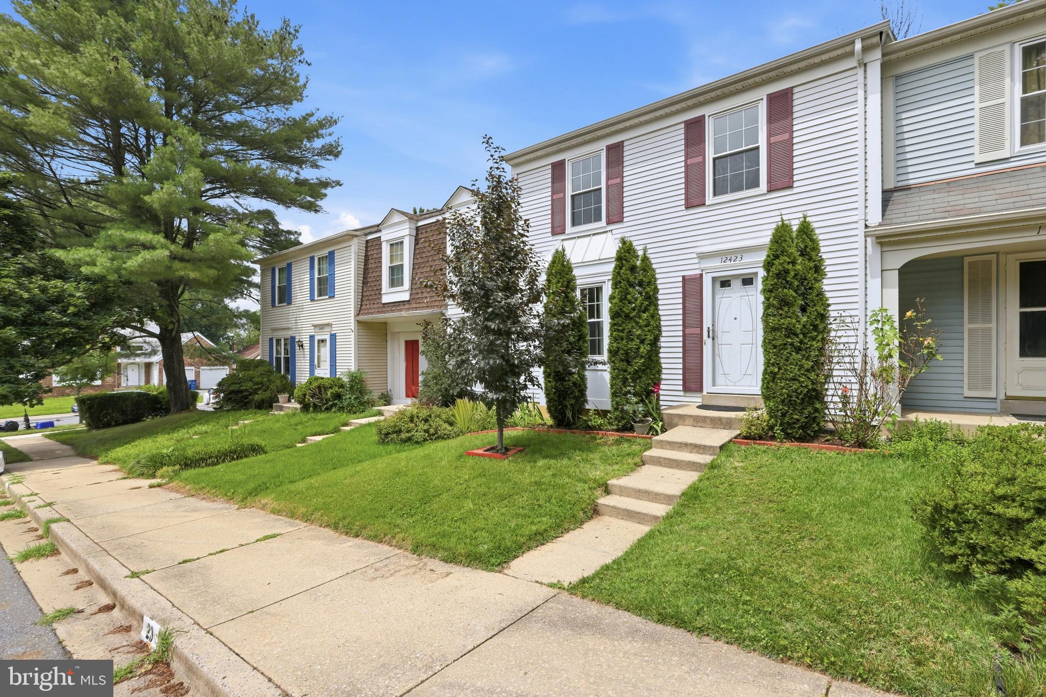 Welcome to this beautifully maintained three level townhome in the desirable Rolling Acres community, offering 3 bedrooms, 2.5 bathrooms, and nearly 1,700 square feet of comfortable living space. The thoughtfully designed floor plan features bright and inviting living areas, a spacious kitchen ready for everyday living and entertaining, and a fully finished lower level that provides the perfect space for a recreation room, home office, gym, or guest retreat. Upstairs, you'll find generously sized bedrooms, including a spacious primary suite with its own private bath. Enjoy the convenience of assigned parking and a low-maintenance lifestyle in this well-established neighborhood. Ideally located just minutes from Fairland Regional Park, White Oak Town Center, Burtonsville Crossing, and an abundance of shopping, dining, and everyday conveniences. Commuters will appreciate the easy access to Route 29, ICC (MD-200), I-95, and I-495, making travel to Washington, D.C., Baltimore, Columbia, and surrounding areas effortless. Don't miss this fantastic opportunity to make this charming townhome your own!