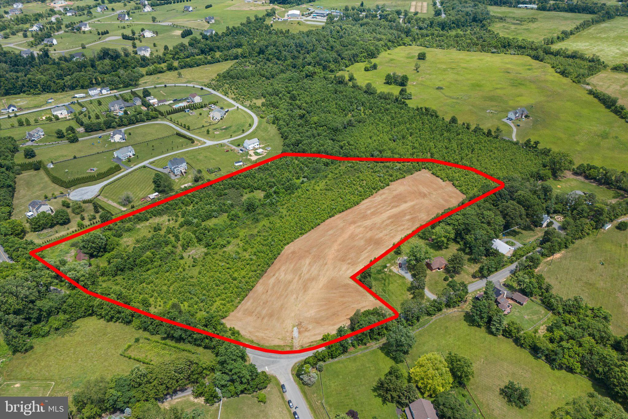 This Lucketts-area lot offers stunning Sugarloaf Mountain views from approved homesites and is ideally located just 12 minutes from Leesburg and within 30 minutes of Frederick, Harpers Ferry, and surrounding areas. Property improvements include an installed well, a previously approved septic field with designated system type, completed soil testing, and a geophysical survey confirming house and driveway locations. Features include a VDOT-approved entrance, proximity to public utilities, a scenic stream, acres of quality soil suitable for farming, and antique outbuildings with old-growth barn wood. The property is well-suited for equestrian use, allowing for horses, stables, and related facilities.  Property features a wet weather stream and barn that needs restoration.  Great location! PROPERTY CANNOT BE SUBDIVIDED,.