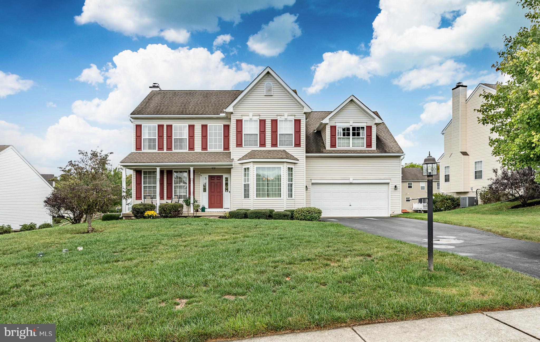 Welcome home to 321 Hidden Creek Dr, a stunning 4-bedroom, 2.5-bathroom single-family home nestled in the sought-after Woods at Edges Mill neighborhood in Downingtown. This beautifully maintained home offers a perfect blend of comfort, style, and convenience. As you approach, you'll be greeted by a charming covered front porch—an inviting spot to enjoy your morning coffee. Step inside the entryway and immediately appreciate the gorgeous hardwood flooring and neutral paint that flows throughout the home. To the right, the formal dining room is bathed in natural light from large windows and features elegant chair rail molding and a classic chandelier, creating the perfect setting for memorable gatherings. Continue down the hall to the spacious eat-in kitchen with beautiful granite countertops, where a large island provides ample countertop space for meal prep and entertaining. The dining area opens directly to the private back deck, making indoor-outdoor hosting effortless. Adjacent to the kitchen, the cozy family room boasts fresh carpeting, abundant natural light, and a gas fireplace—ideal for relaxing evenings. A separate formal living room offers versatility as a sitting area, home office, or playroom. A convenient half bathroom completes the main floor. Upstairs, the primary suite is a true retreat that is way bigger than most being over 350 sq. ft in just the bedroom (not including the bathroom and walk in closet), featuring plush carpeting and a cozy seating area. The ensuite bathroom is designed for relaxation, with dual sinks, a stand-up shower, and a large soaking tub. Three additional bedrooms are found on the second level, which all share a well-appointed full hall bathroom. The partially finished walk-out basement expands your living space with brand-new flooring, recessed lighting, and endless possibilities—whether you envision a home entertainment center, gym, or recreation area - while also providing ample storage space, as well. Step outside onto your private back deck and enjoy upcoming peaceful spring and summer evenings. Located in a quiet and desirable neighborhood, this home offers the perfect balance of tranquility and convenience, with easy access to shopping, dining, and major roadways. Don't miss the opportunity to make 321 Hidden Creek Dr your dream home—schedule a showing today! Taxes should be re-assessed. Other properties in neighborhood are around  $9k.