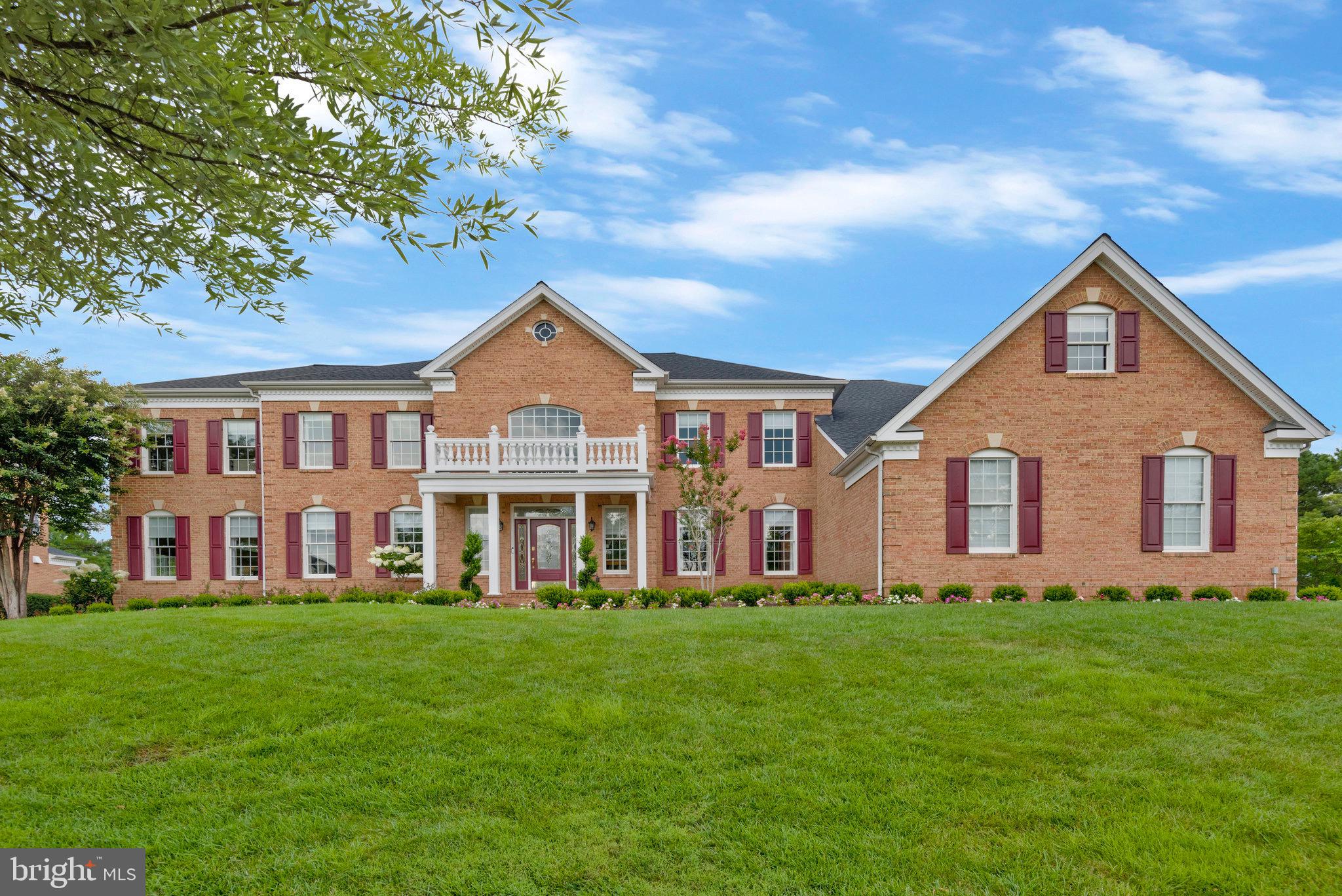 YOUR LUCKY DAY!!! BACK ON THE MARKET - BUYERS HOME SALE CONTINGENCY EXPIRED.   Welcome to the epitome of luxury living at the highly coveted Dominion Valley Country Club. Stepping into the grand two-story foyer with dual curved staircases sets the tone for the elegance within this upgraded  4 sided brick home.  The residence boasts a seamless blend of spaciousness and meticulously crafted living areas that exude versatility and grandeur at every corner. With new custom light fixtures and chandeliers adorning the house, the magnificent Hampton Model offers breathtaking views of the golf course and stands as a true masterpiece that captures attention from the moment you enter. Over $300,000 worth of luxurious updates have transformed this home into an elegant sanctuary, sparing no expense. The main level features newly refinished hardwood floors, elegant moldings, and custom-made curtains. The kitchen, a culinary enthusiast's delight with over $100,000 invested in a complete remodel, boasts new cabinetry with under-cabinet lighting, top-of-the-line wifi-enabled appliances, and exquisite quartzite countertops and backsplash. A 6-burner gas range with hood and a 10-foot island with seating on both sides enhance the kitchen's functionality and style. The family room offers a cozy ambiance with a renovated two-story gas fireplace, complemented by custom draperies in every room and custom carpets leading to the upper bedrooms. The covered back porch off the kitchen provides a serene spot to enjoy the views of the Arnold Palmer Golf Course's picturesque hole #3. For added tranquility, the 400 sq. ft. conservatory with abundant natural light and new hardwood flooring awaits. Upstairs, four bedrooms with ensuite bathrooms ensure privacy and comfort, while the primary bedroom's upgraded closets maximize storage. The lower level features a fully finished basement with an exercise room, complete kitchen, two full bathrooms, family room, den/flex space, and ample storage. Updates include new washer and dryer on the upper level, with an additional set ready to be installed on the main or lower level. This home has significant enhancements, such as lighting fixtures, chandeliers, window treatments, wallpaper, mudroom, basement spaces, garage flooring, exterior lighting, and landscaping. Roof and HVAC were replaced in 2022. Professional landscaping upgrades in 2023. Dominion Valley Community amenities include  Clubhouse, Sports Pavilion, pools, courts, tot lots, fishing ponds, fitness facilities, and golf memberships. Conveniently located near major routes, shopping, and dining, this remarkable residence offers the pinnacle of fine living.
Please see document sections for more information!