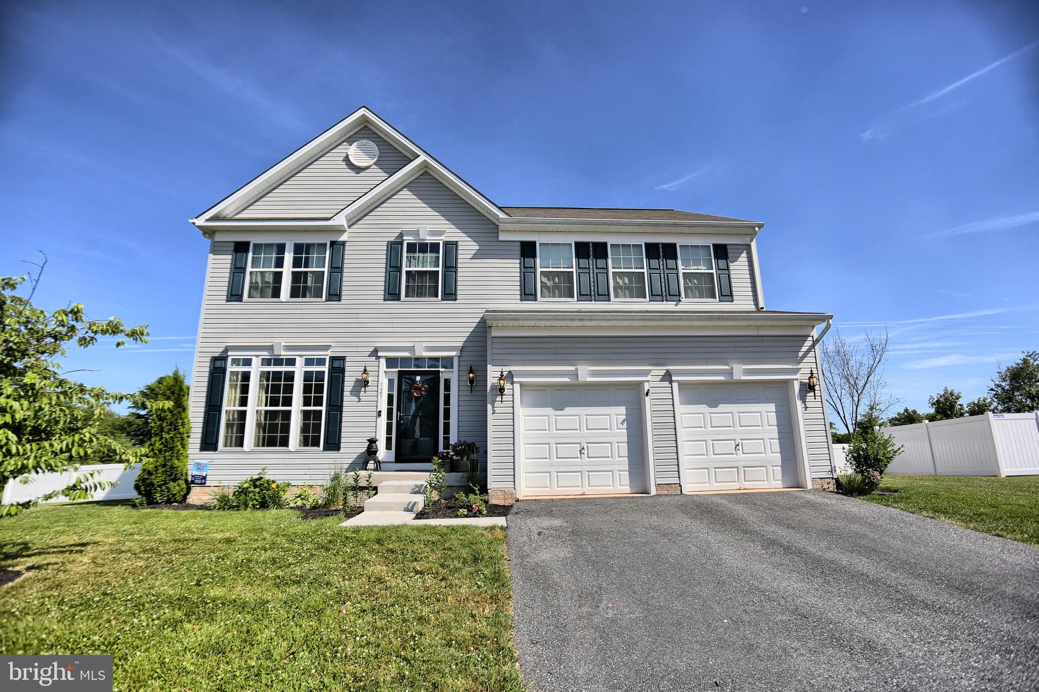 "The Hampton" one of the largest homes in Creekside built by Bob  Ward Companies in 2015.  Has a 4' extended family room and 4' extended basement . Over 2,762 square feet makes this a really large home for a growing family.  4 large bedrooms and 2 full bathrooms and laundry room all on upper level.  The first floor has 9' ceilings and a 2-story foyer.  A huge gourmet eat-in kitchen 24'x13' with granite counters and large granite island and recessed lighting. Stainless steel appliances and tons of kitchen cabinetry.  The large family room is 19'x18' and the living/dining room is 21'x18'.  The basement is unfinished, but again it is enormous and could easily be finished and also has a full bath rough-in and an exit door with steps to the rear yard. Radon system included. Has a large 80 gallon HWH and a culligan water system installed. Nice size 2-car front entrance garage with double doors.  Great back yard with a beautiful view and backing up to a 100 acre parcel zoned "Agriculture".  Extremely large rear concrete patio 42'x15' with an 12' round concrete pad with a firepit included. Has a beautiful 4' high rear vinyl fence.  There is so much more! Don't wait - hurry.
