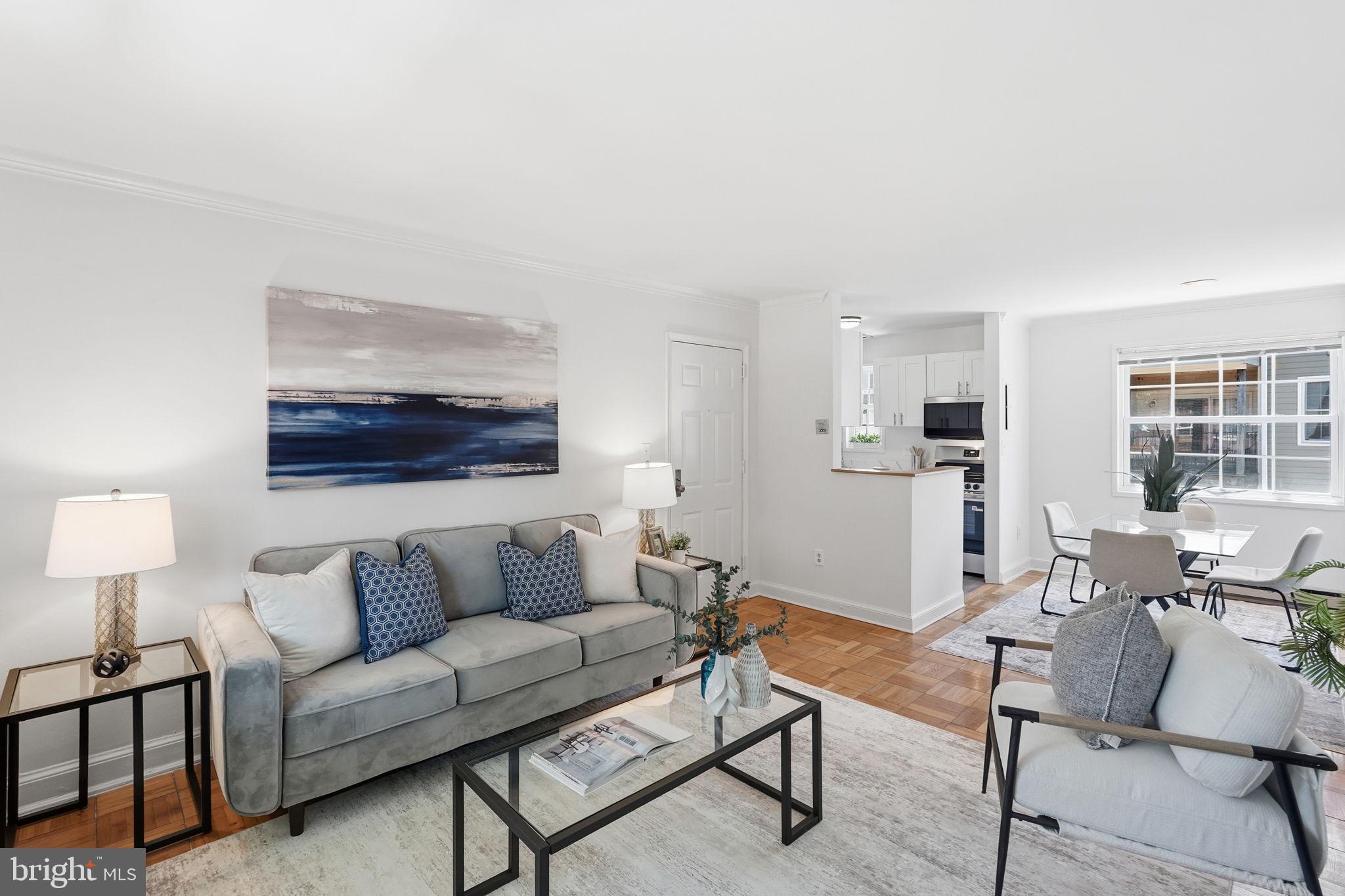 Imagine walking out your front door and having almost everything you need within a few blocks. That's everyday life at Potowmack Crossing.

This top-floor two-bedroom, one-and-a-half-bath condo sits in the heart of North Old Town Alexandria — one of the most walkable, livable pockets. The updated kitchen features quartz countertops, shaker style cabinets and stainless steel kitchen appliances.  The kitchen flows naturally into the living and dining areas with charming parquet floors, the bedrooms have fresh carpet, and an in-unit washer and dryer means no more laundromat runs. The updated full bathroom blends charm and polish, pairing classic character with fresh, modern finishes throughout. The second bedroom is ideal for an office or guest space. 

Step outside and the neighborhood does the rest. Coffee in the morning, groceries on the way home, dinner out on a Tuesday just because — it's all walkable. Old Town's boutiques, restaurants, and waterfront are steps away, and Del Ray's farmers' markets and laid-back café scene are close by for ease. 

When you need to get somewhere, getting there is easy. Commuters will love the proximity to the GW Parkway, Reagan National Airport, and Potomac Yard Metro access — making trips to DC easily accessible. 

And when the week is finally over? The Mount Vernon Trail is right there for a morning run or weekend bike ride along the Potomac. Daingerfield Island, the Washington Sailing Marina, and Gravelly Point are minutes away for picnics, kayaking, or just watching planes land over the river.

The community itself has a charming garden-style setting with a pool, fitness center, clubhouse, tennis courts, and plenty of parking. 

This is more than a condo — it's a lifestyle upgrade, move-in ready and waiting for you!

Recent updates: Full kitchen remodel (May 2026), Full and Half Bathroom remodel (May 2026) New appliances (June 2026), New Carpet (June 2026), New HVAC systems (June 2026)